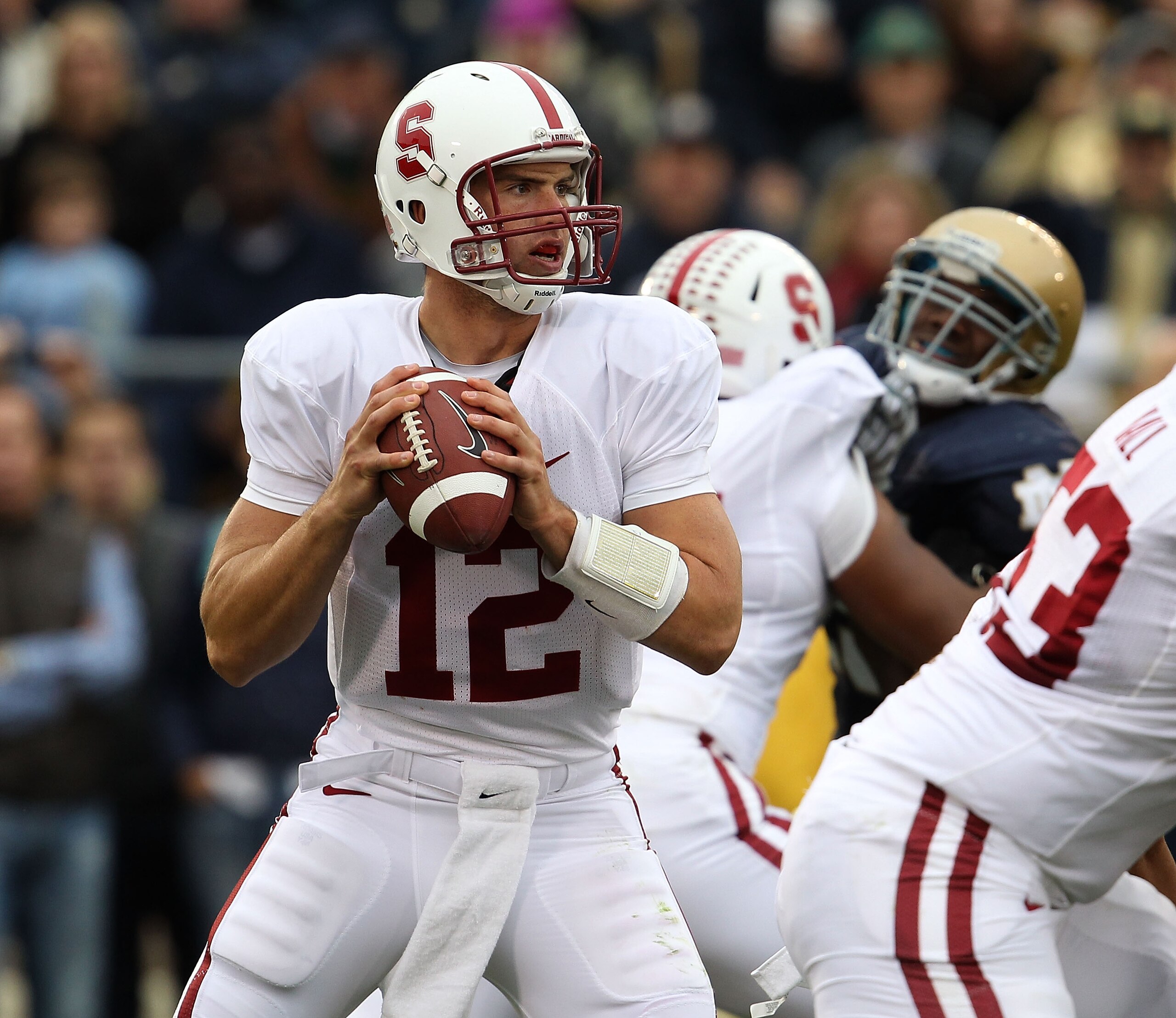 SOUTH BEND, IN - SEPTEMBER 25: Andrew Luck #12 of the Stanford Cardinal looks for a receiver against the Notre Dame Fighting Irish at Notre Dame Stadium on September 25, 2010 in South Bend, Indiana. Stanford defeated Notre Dame 37-14. (Photo by Jonathan D SOUTH BEND, IN - SEPTEMBER 25: Andrew Luck #12 of the Stanford Cardinal looks for a receiver against the Notre Dame Fighting Irish at Notre Dame Stadium on September 25, 2010 in South Bend, Indiana. Stanford defeated Notre Dame 37-14. (Photo by Jonathan D