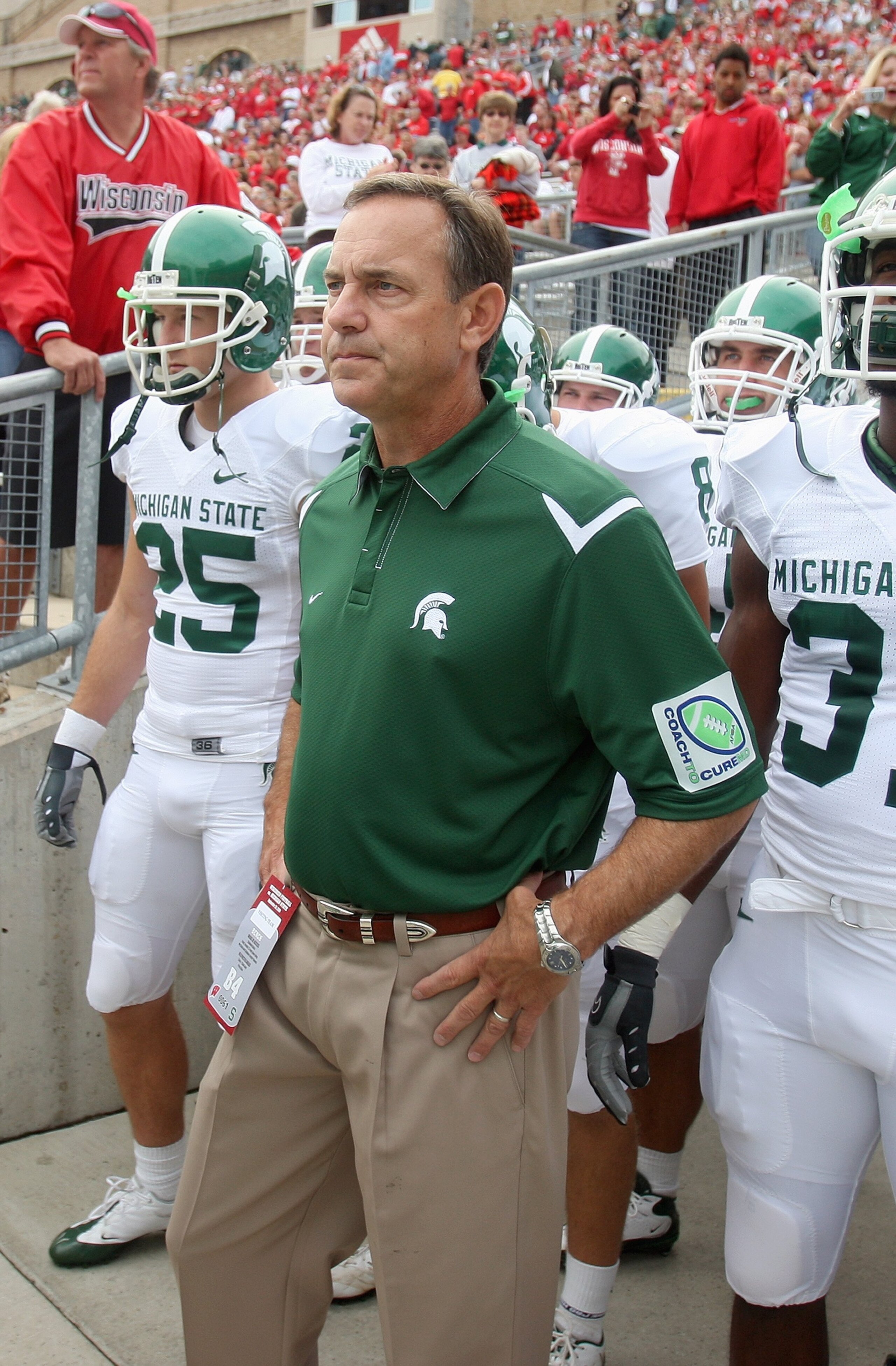 MADISON, WI - SEPTEMBER 26: Head coach Mark Dantonio of the Michigan State Spartans gets ready to lead his team onto the field before the game against the Wisconsin Badgers on September 26, 2009 at Camp Randall Stadium in Madison, Wisconsin. (Photo by Jon MADISON, WI - SEPTEMBER 26: Head coach Mark Dantonio of the Michigan State Spartans gets ready to lead his team onto the field before the game against the Wisconsin Badgers on September 26, 2009 at Camp Randall Stadium in Madison, Wisconsin. (Photo by Jon