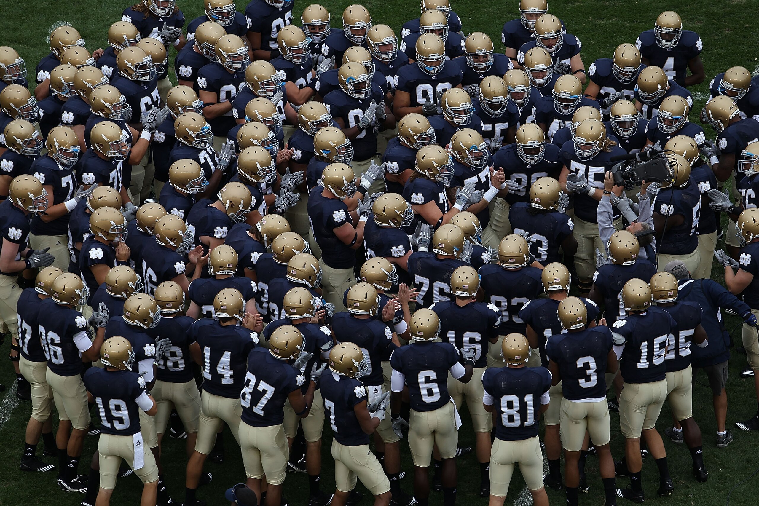 SOUTH BEND, IN - SEPTEMBER 25: Members of the Notre Dame Fighting Irish get ready during warm-ups to play the Stanford Cardinal at Notre Dame Stadium on September 25, 2010 in South Bend, Indiana. Stanford defeated Notre Dame 37-14. (Photo by Jonathan Dani