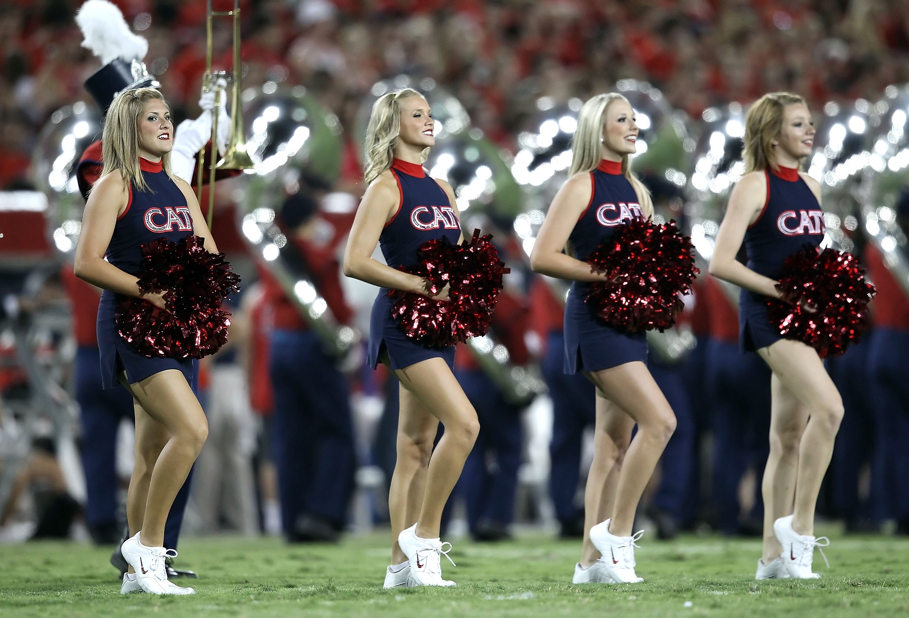 TUCSON, AZ - SEPTEMBER 25:  The Arizona Wildcats cheerleaders perform before the college football game against the California Bears at Arizona Stadium on September 25, 2010 in Tucson, Arizona.   The Wildcats defeated the Golden Bears 10-9.  (Photo by Chri