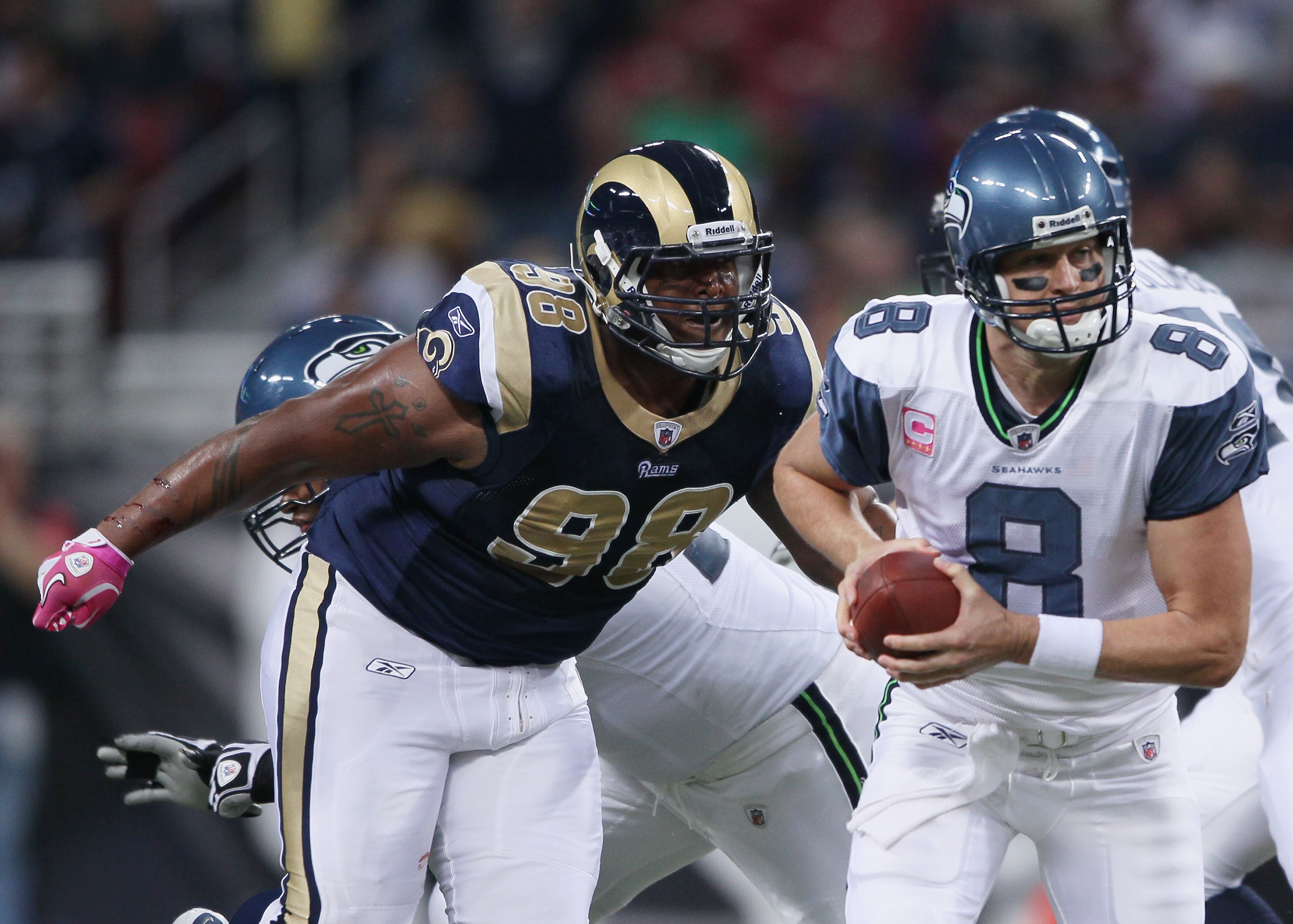 ST. LOUIS - OCTOBER 03:  3: Fred Robbins #98 of the St. Louis Rams sacks Matt Hasselbeck #8 of the Seattle Seahawks on October 3, 2010 at Edward Jones Dome in St. Louis, Missouri.  (Photo by Elsa/Getty Images)