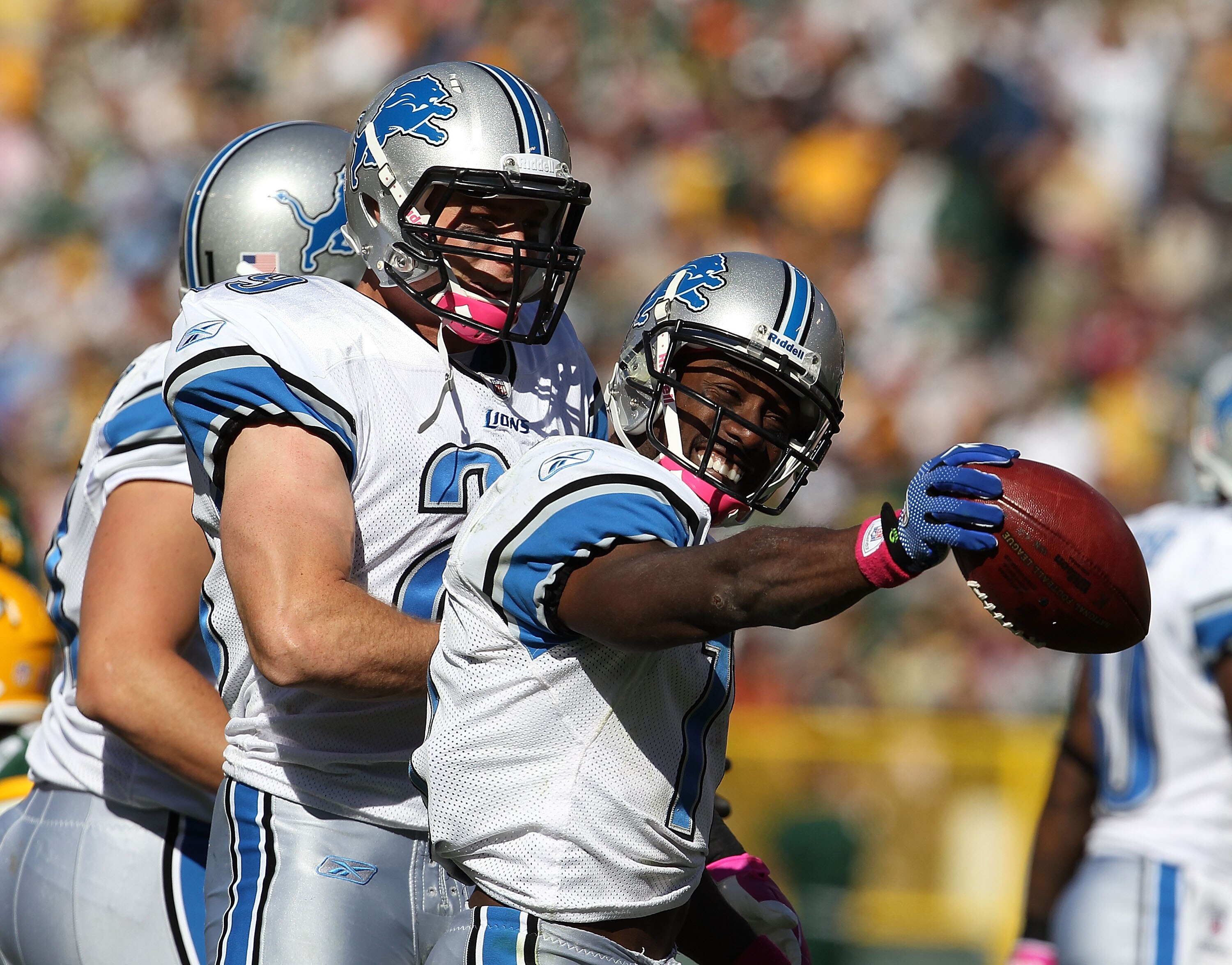 GREEN BAY, WI - OCTOBER 03: Stefan Logan #11 of the Detroit Lions celebrates recovering a fumble against the Green Bay Packers with teammate John Wendling #29 at Lambeau Field on October 3, 2010 in Green Bay, Wisconsin. The Packers defeated the Lions 28-2