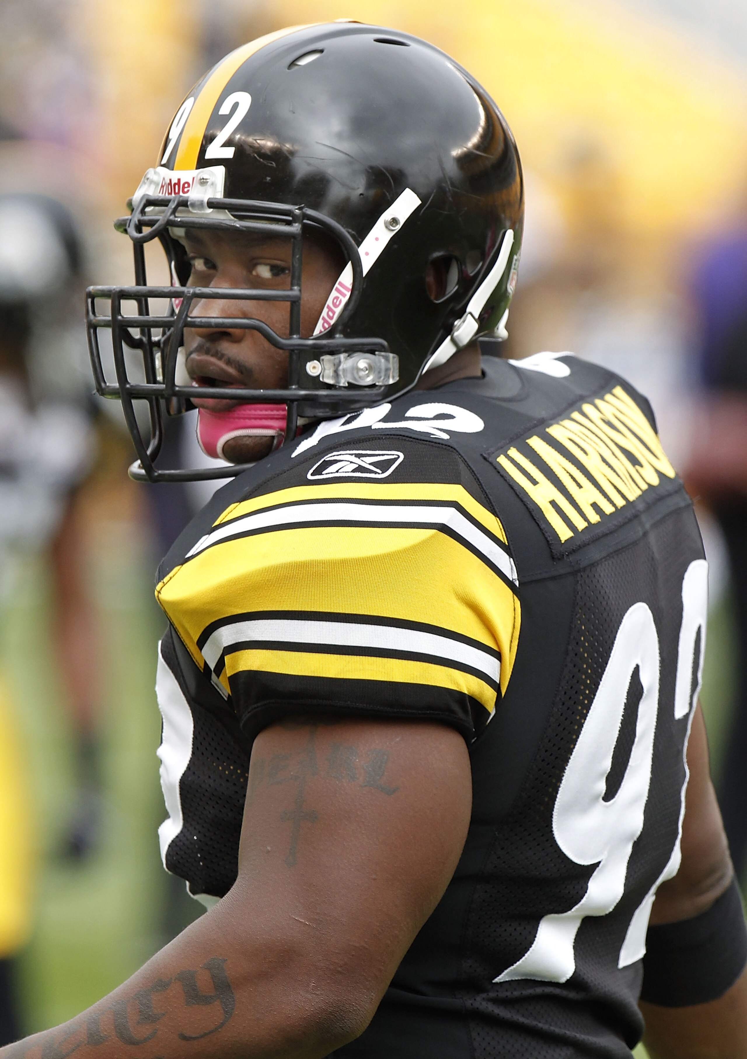 PITTSBURGH - OCTOBER 03:  James Harrison #92 of the Pittsburgh Steelers wears a pink chin strap for breast cancer awareness prior to playing the Baltimore Ravens on October 3, 2010 at Heinz Field in Pittsburgh, Pennsylvania.  (Photo by Gregory Shamus/Gett