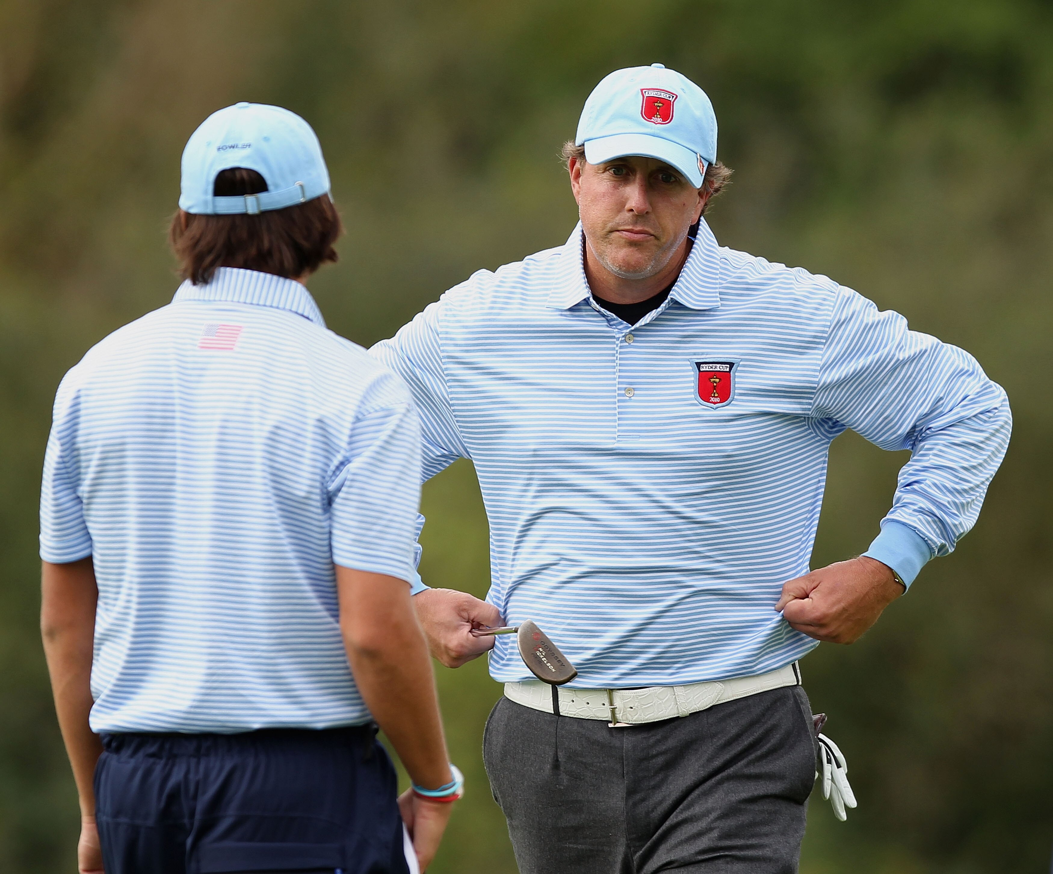 NEWPORT, WALES - OCTOBER 03:  Rickie Fowler of the USA looks on with Phil Mickelson (R) during the  Fourball & Foursome Matches during the 2010 Ryder Cup at the Celtic Manor Resort on October 3, 2010 in Newport, Wales.  (Photo by Ross Kinnaird/Getty Image