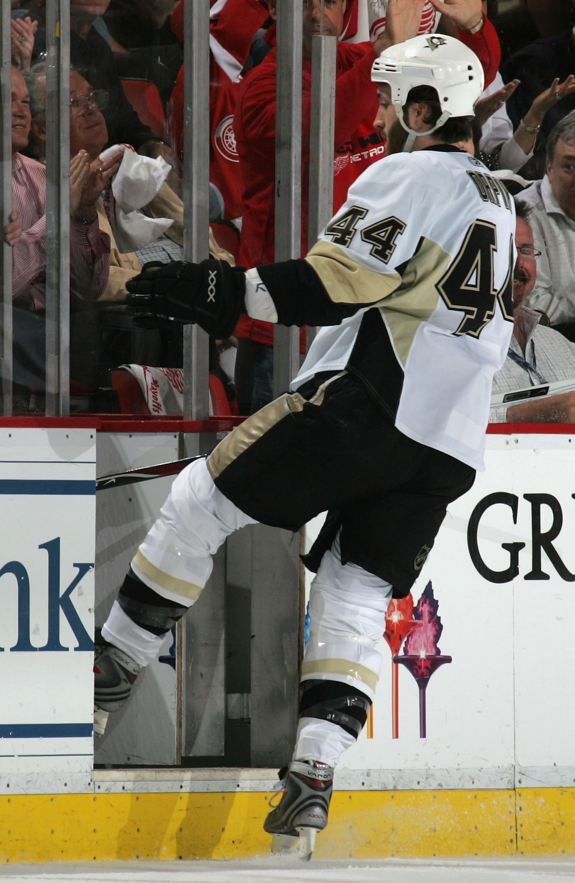 DETROIT - JUNE 02:  Brooks Orpik #44 of the Pittsburgh Penguins skates into the penalty box during game five of the 2008 NHL Stanley Cup Finals against the Detroit Red Wings at Joe Louis Arena on June 2, 2008 in Detroit, Michigan.  (Photo by Bruce Bennett