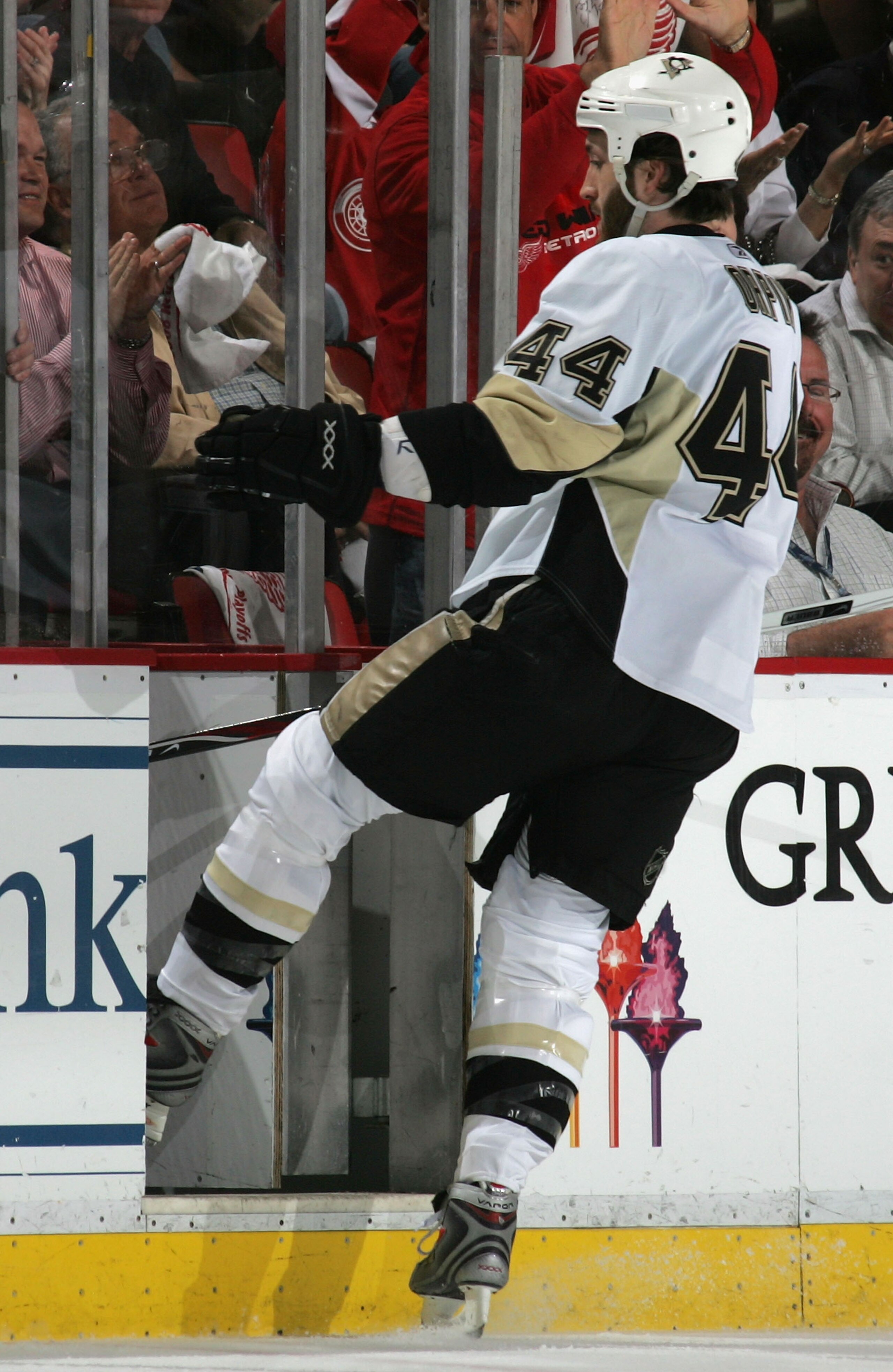 DETROIT - JUNE 02:  Brooks Orpik #44 of the Pittsburgh Penguins skates into the penalty box during game five of the 2008 NHL Stanley Cup Finals against the Detroit Red Wings at Joe Louis Arena on June 2, 2008 in Detroit, Michigan.  (Photo by Bruce Bennett