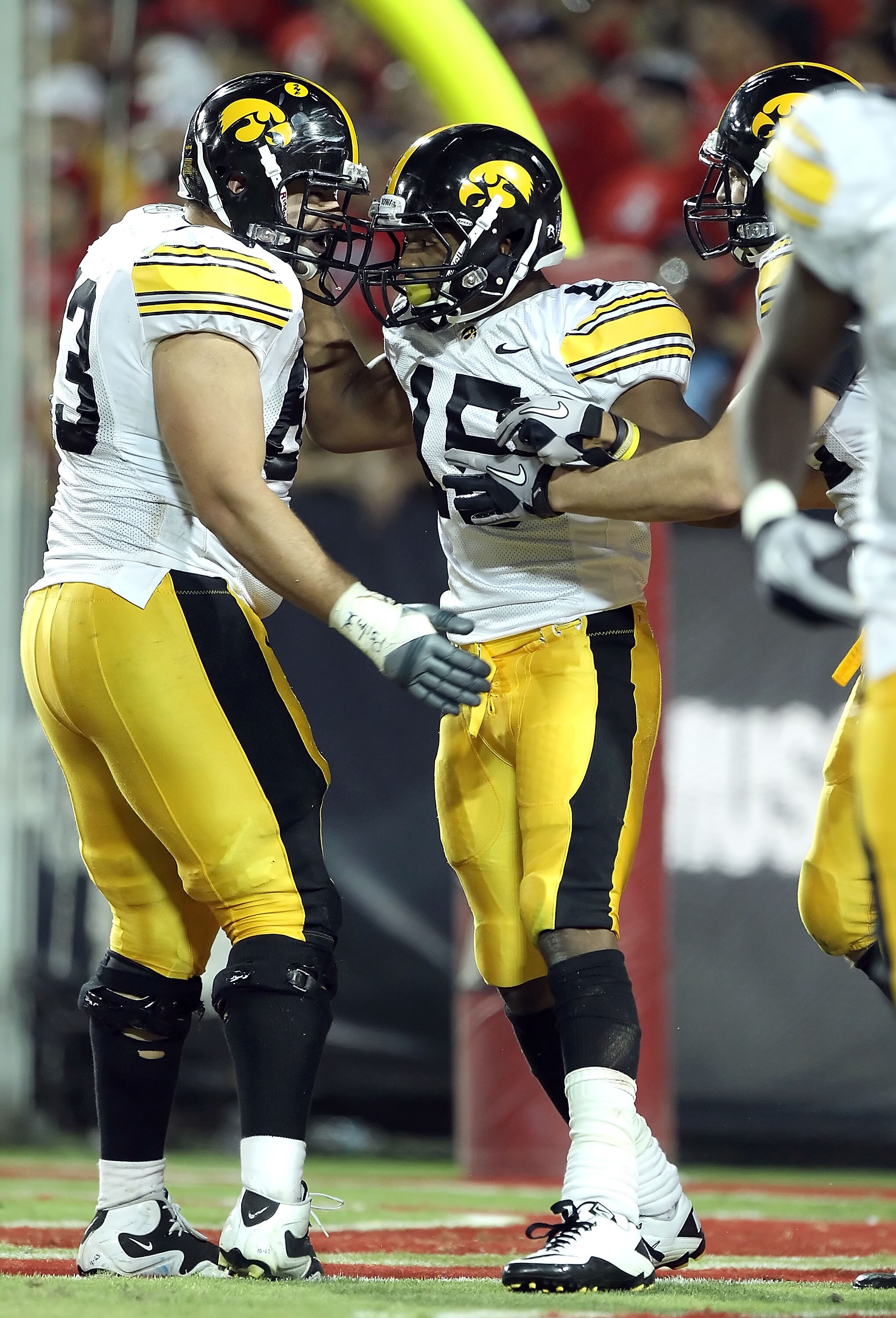 TUCSON, AZ - SEPTEMBER 18:  Wide receiver Derrell Johnson-Koulianos #15 of the Iowa Hawkeyes celebrates after scoring a touchdown during the college football game against the Arizona Wildcats at Arizona Stadium on September 18, 2010 in Tucson, Arizona. Th