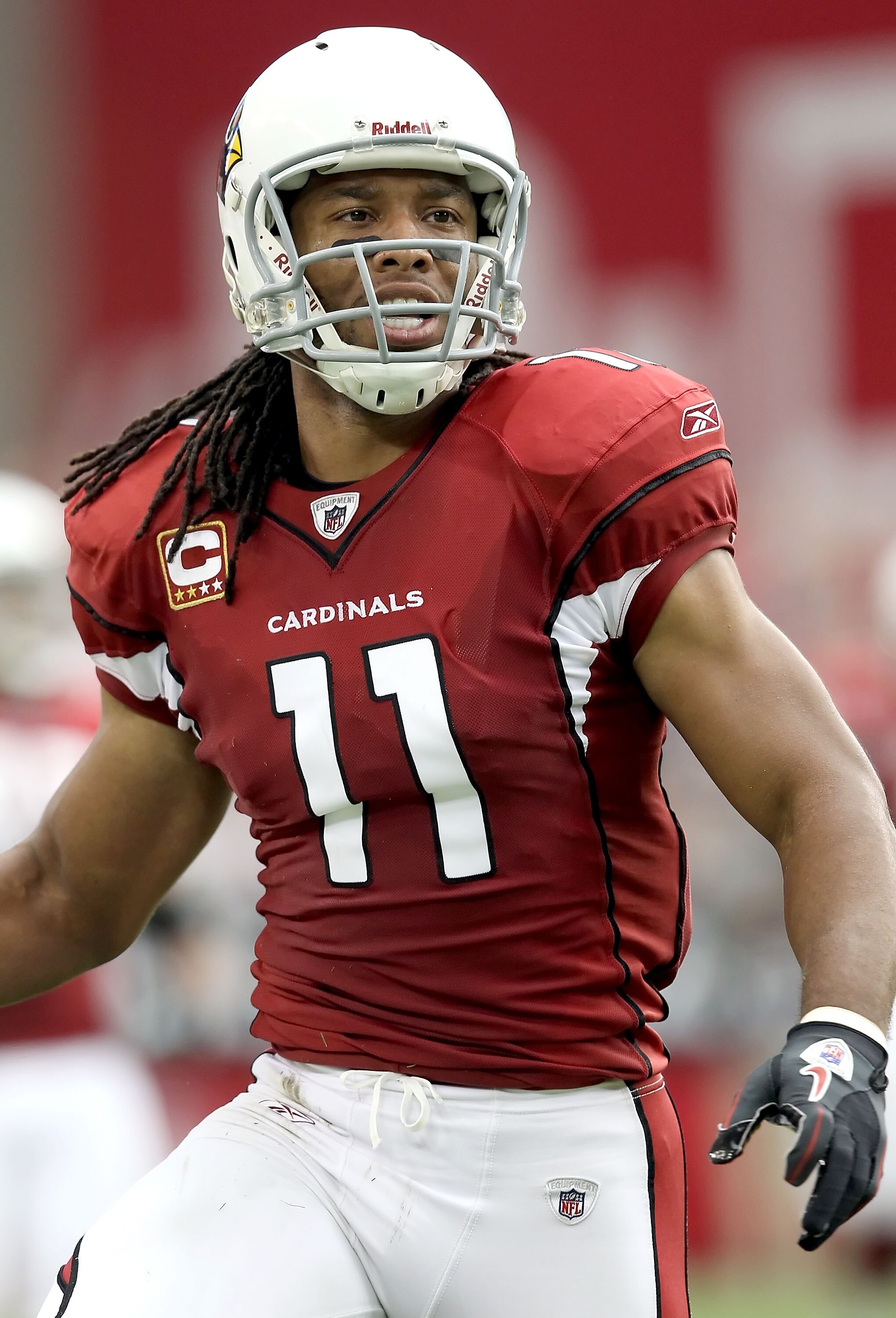 GLENDALE, AZ - SEPTEMBER 26:  Wide receiver Larry Fitzgerald #11 of the Arizona Cardinals during the NFL game against the Oakland Raiders at the University of Phoenix Stadium on September 26, 2010 in Glendale, Arizona.  The Cardinals defeated the Raiders 