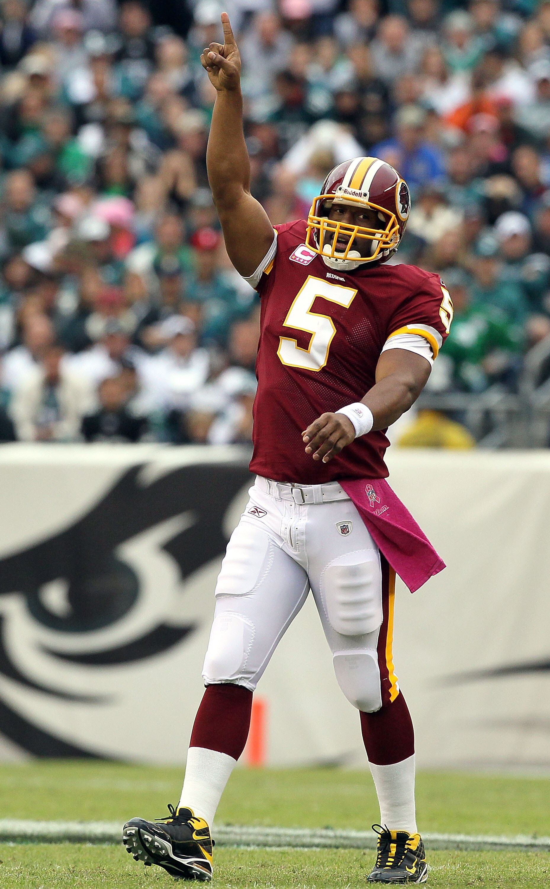 PHILADELPHIA - OCTOBER 03:  Donovan McNabb #5 of the Washington Redskins celebrates after throwing a first quater touchdown pass against the Philadelphia Eagles on October 3, 2010 at Lincoln Financial Field in Philadelphia, Pennsylvania.  (Photo by Jim Mc