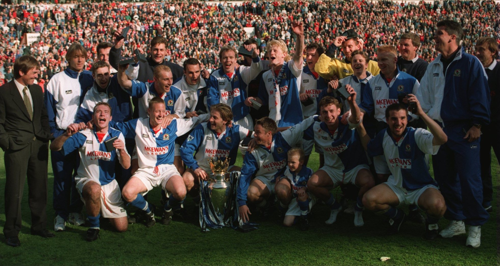 14 MAY 1994:  BLACKBURN ROVERS CELEBRATE WITH THE CUP AFTER CLINCHING THE FA CARLING PREMIERSHIP TROPHY DESPITE LOSING 1-2 TO LIVERPOOL IN THEIR FA CARLING PREMIERSHIP MATCH AT ANFIELD, LIVERPOOL. Mandatory Credit: Allsport UK/ALLSPORT