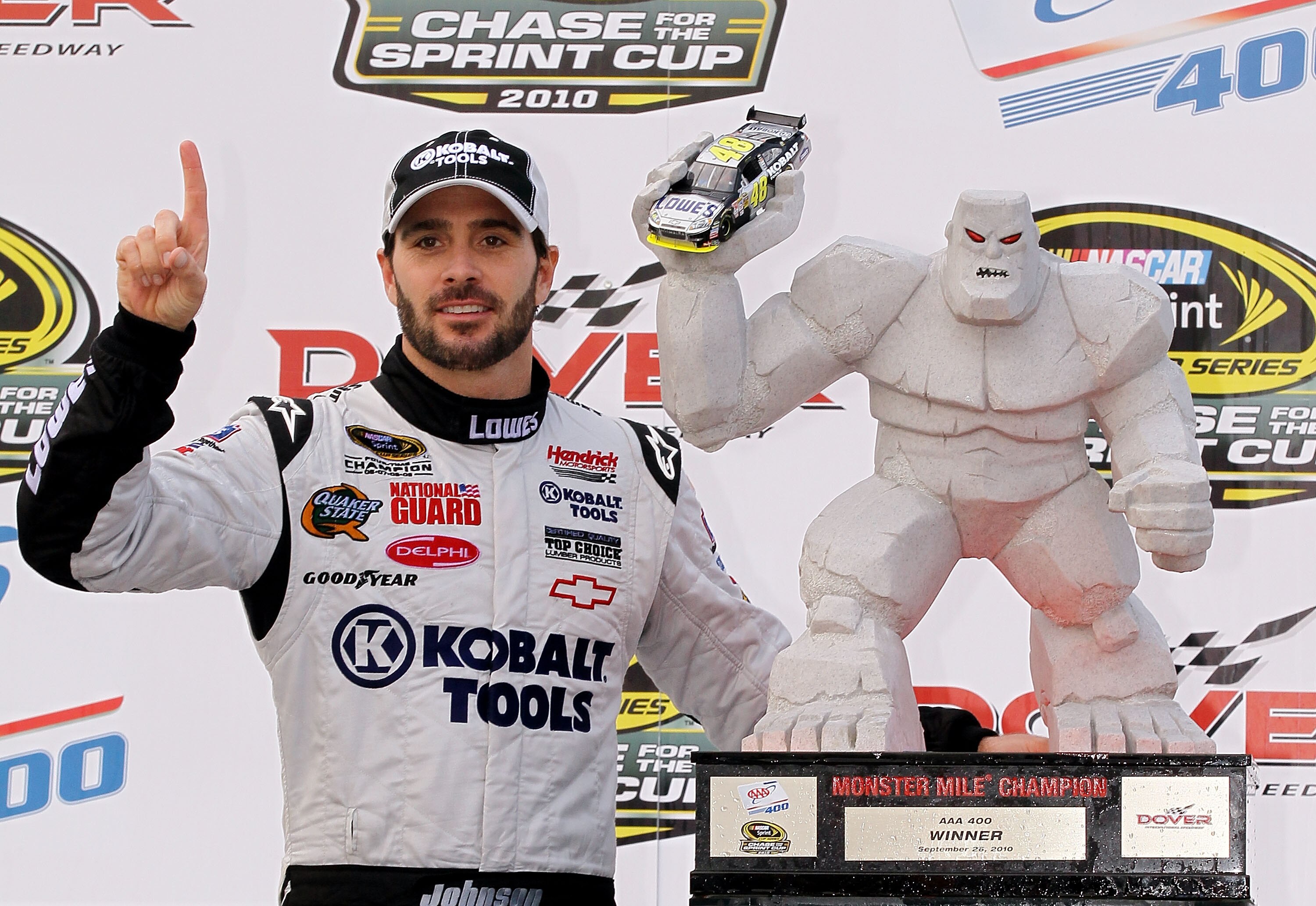 DOVER, DE - SEPTEMBER 26:  Jimmie Johnson, driver of the #48 Lowe's Chevrolet, celebrates in Victory Lane after winning the NASCAR Sprint Cup Series AAA 400 at Dover International Speedway on September 26, 2010 in Dover, Delaware.  (Photo by Jim McIsaac/G