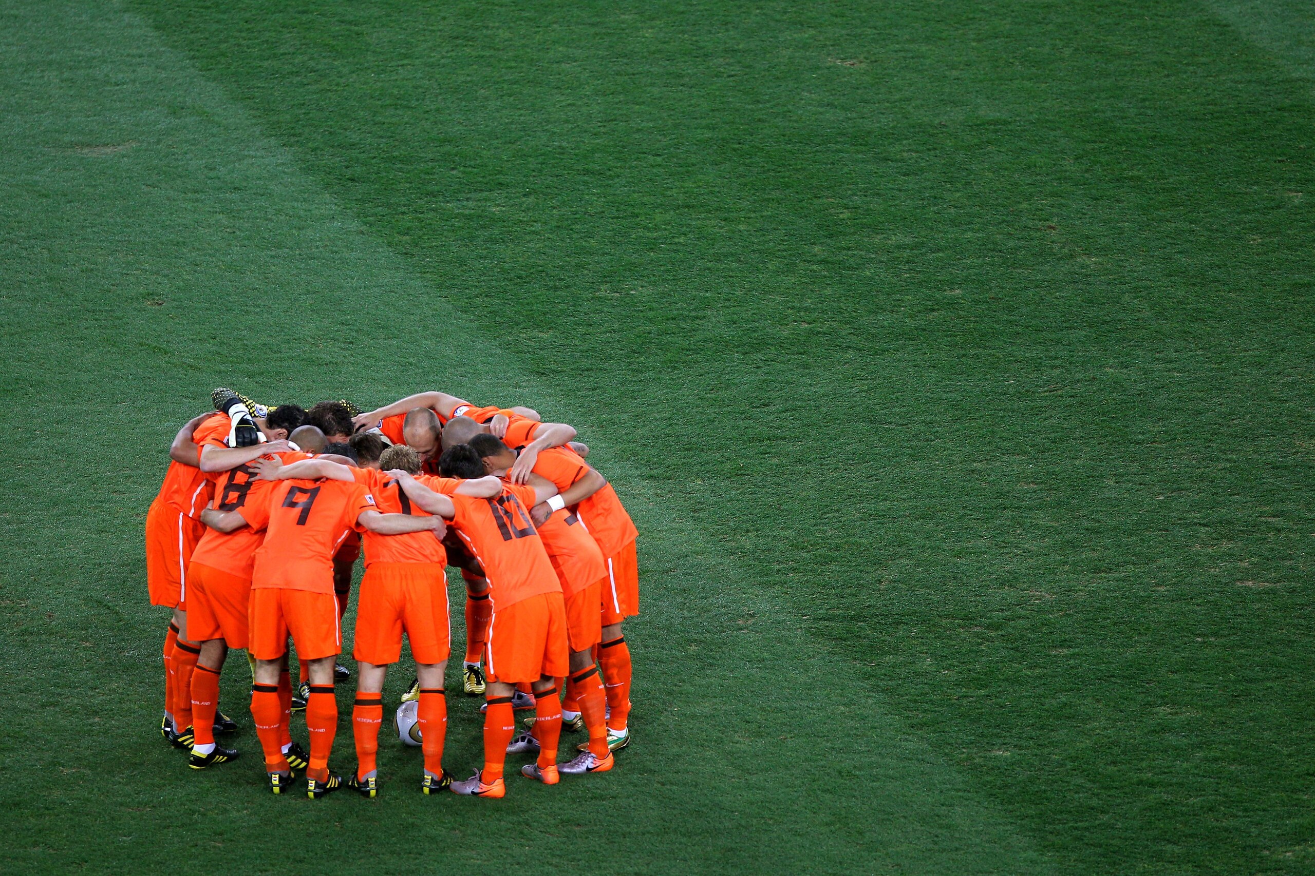 JOHANNESBURG, SOUTH AFRICA - JULY 11:  The Netherlands team huddle ahead of the 2010 FIFA World Cup South Africa Final match between Netherlands and Spain at Soccer City Stadium on July 11, 2010 in Johannesburg, South Africa.  (Photo by Michael Steele/Get