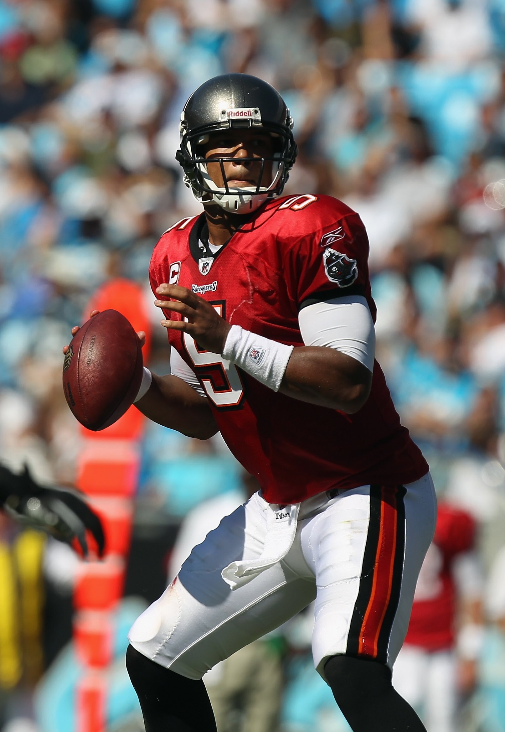 CHARLOTTE, NC - SEPTEMBER 19:  Josh Freeman #5 of the Tampa Bay Buccaneers throws a pass against the Carolina Panthers during their game at Bank of America Stadium on September 19, 2010 in Charlotte, North Carolina.  (Photo by Streeter Lecka/Getty Images)