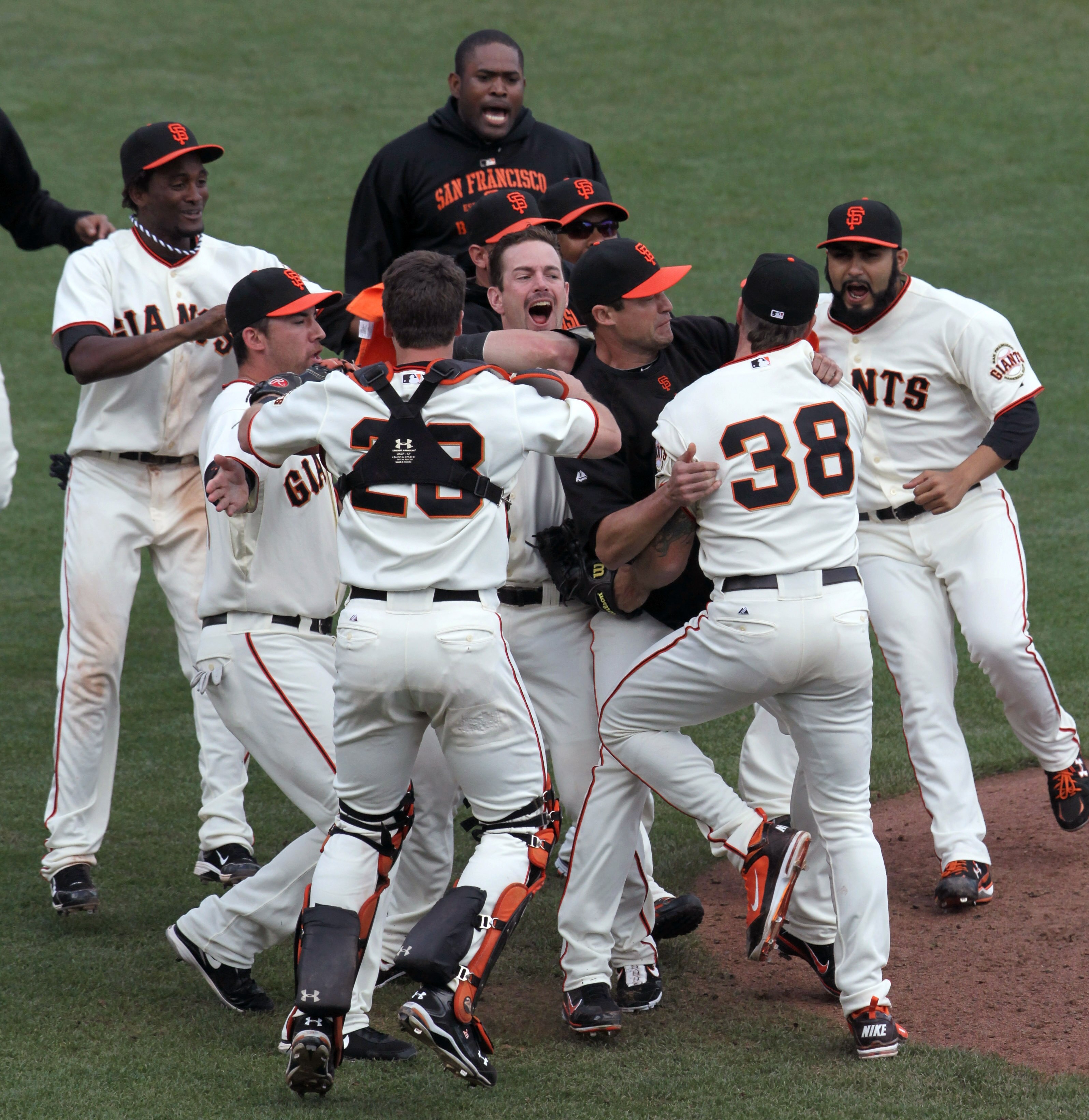 SAN FRANCISCO - OCTOBER 03:  San Francisco Giants players celebrate after clinching the National League West divsion against the San Diego Padres at AT&T Park on October 3, 2010 in San Francisco, California.  The Giants beat the Padres 3-0.  (Photo by Jus