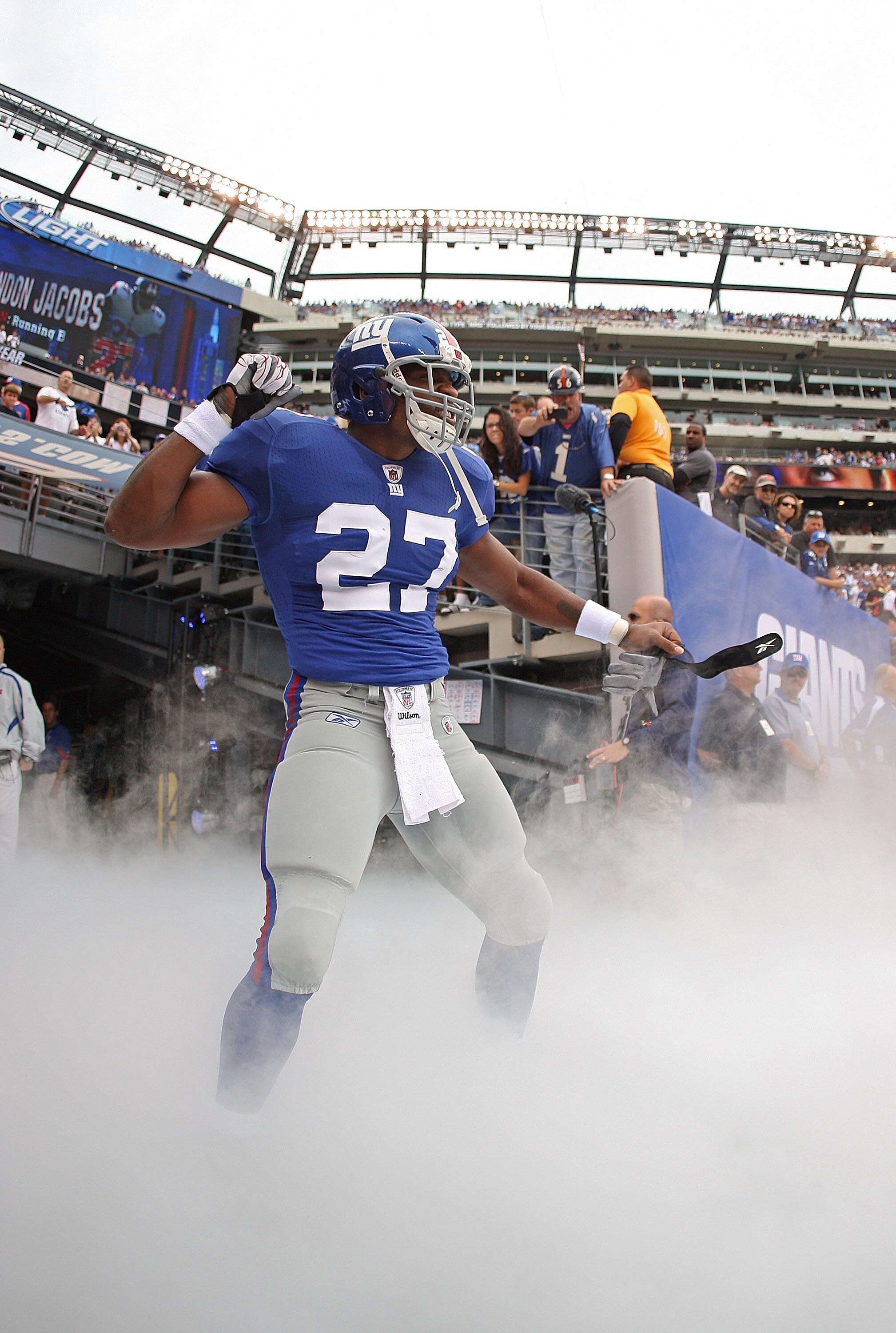 EAST RUTHERFORD, NJ - SEPTEMBER 26:  Brandon Jacobs #27 of the New York Giants comes out of the tunnel during a game against the Tennessee Titans at New Meadowlands Stadium on September 26, 2010 in East Rutherford, New Jersey.  (Photo by Mike Ehrmann/Gett