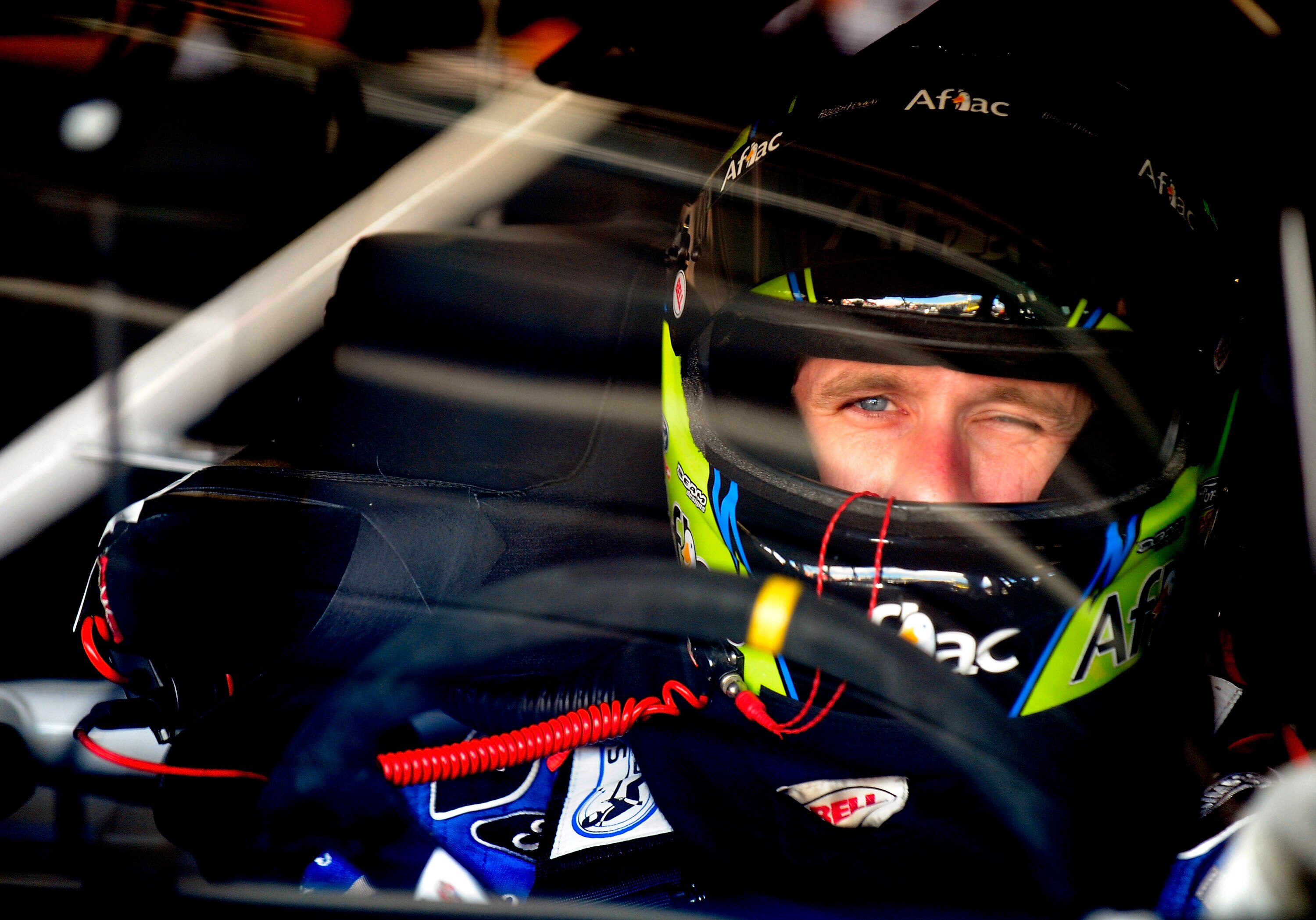KANSAS CITY, KS - OCTOBER 02:  Carl Edwards, driver of the #99 Aflac Ford, sits in his car during practice for the NASCAR Sprint Cup Series Price Chopper 400 on October 2, 2010 in Kansas City, Kansas.  (Photo by Rusty Jarrett/Getty Images for NASCAR)