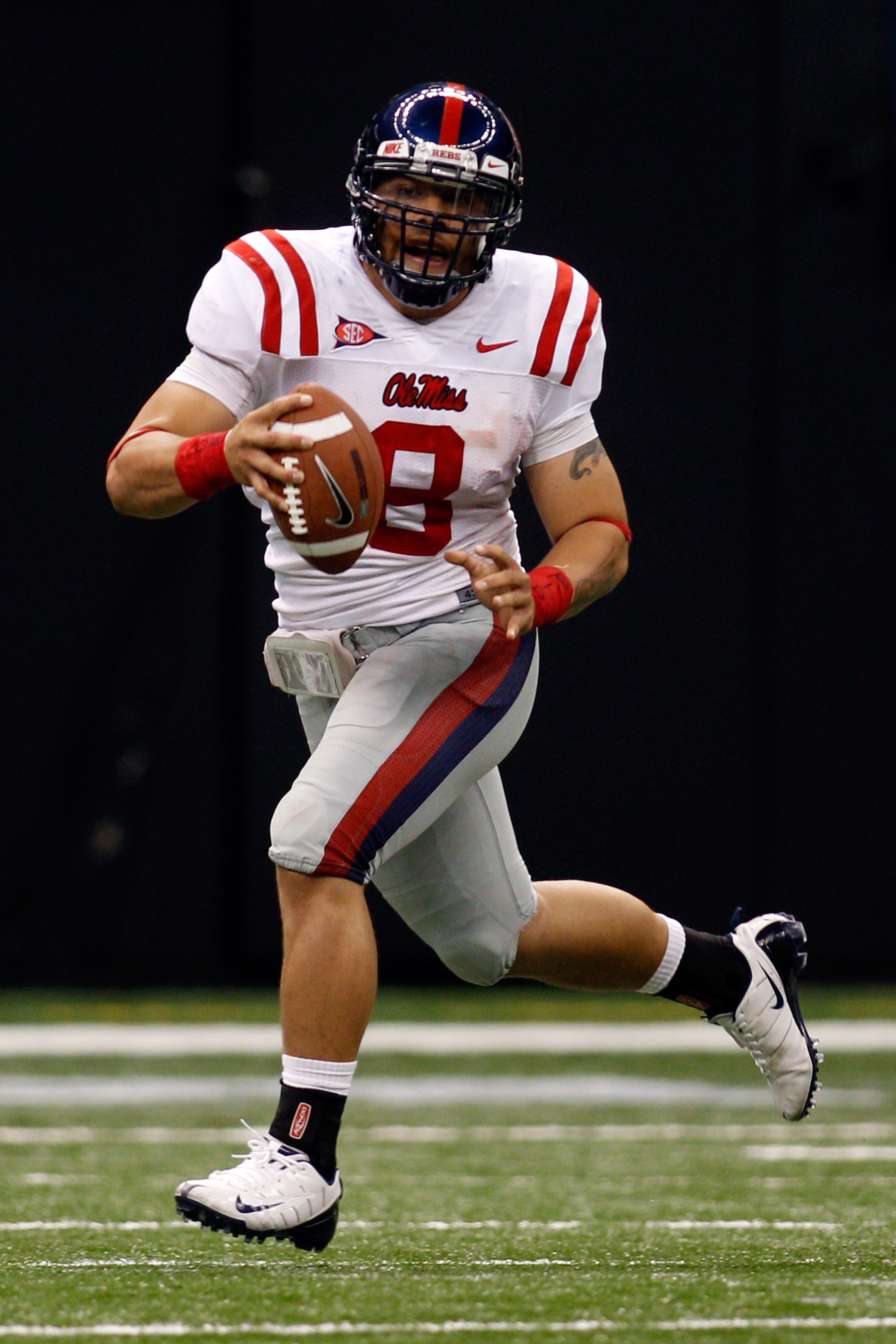 NEW ORLEANS - SEPTEMBER 11:  Jeremiah Masoli #8 of the Ole Miss Rebels in action against the the Tulane Green Wave at the Louisiana Superdome on September 11, 2010 in New Orleans, Louisiana.  Ole Miss defeated Tulane 27-13.  (Photo by Chris Graythen/Getty