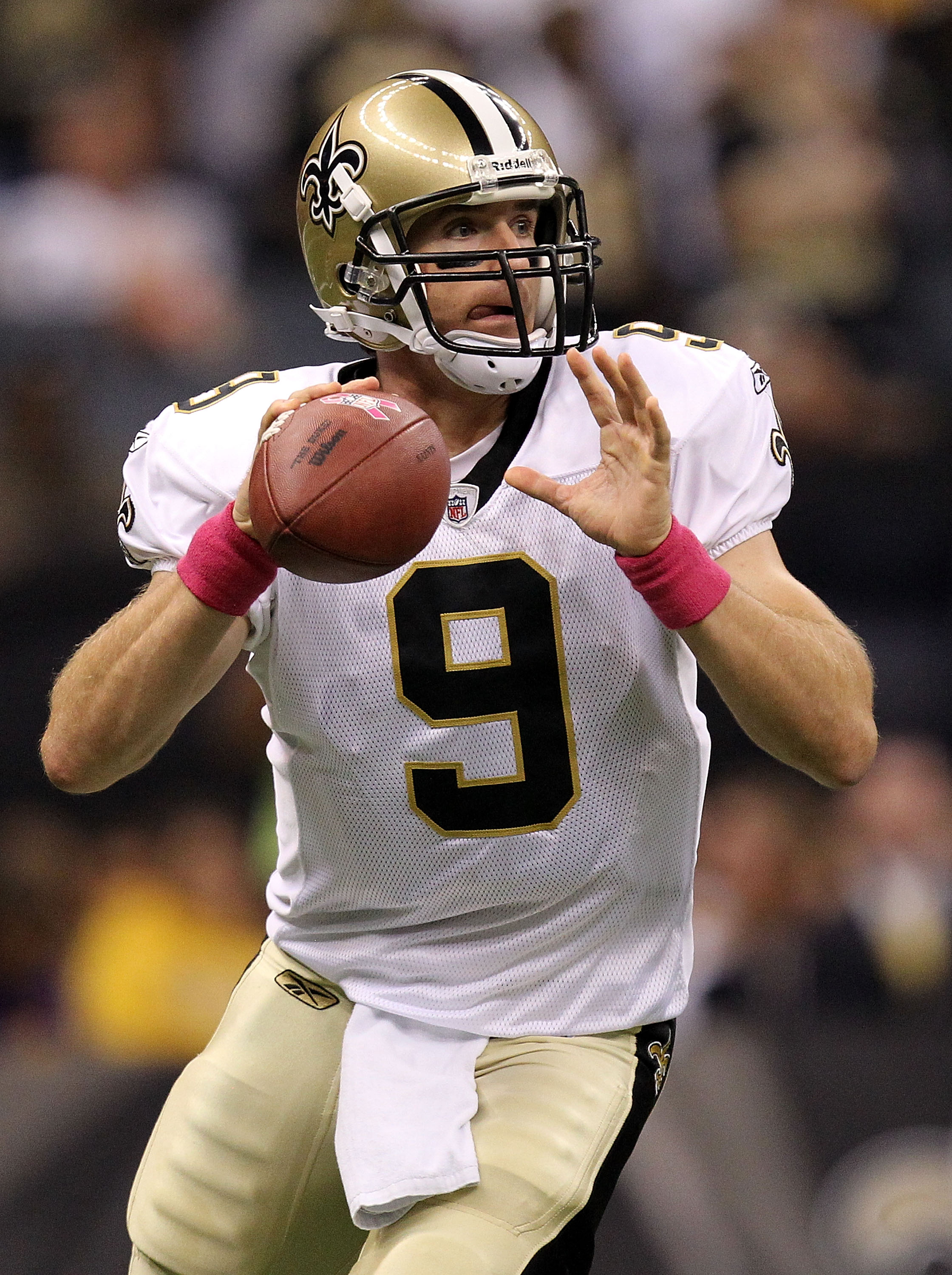 NEW ORLEANS - OCTOBER 03:  Quarterback Drew Brees #9 of the New Orleans Saints passes against the Carolina Panthers at the Louisiana Superdome on October 3, 2010 in New Orleans, Louisiana.  (Photo by Ronald Martinez/Getty Images)