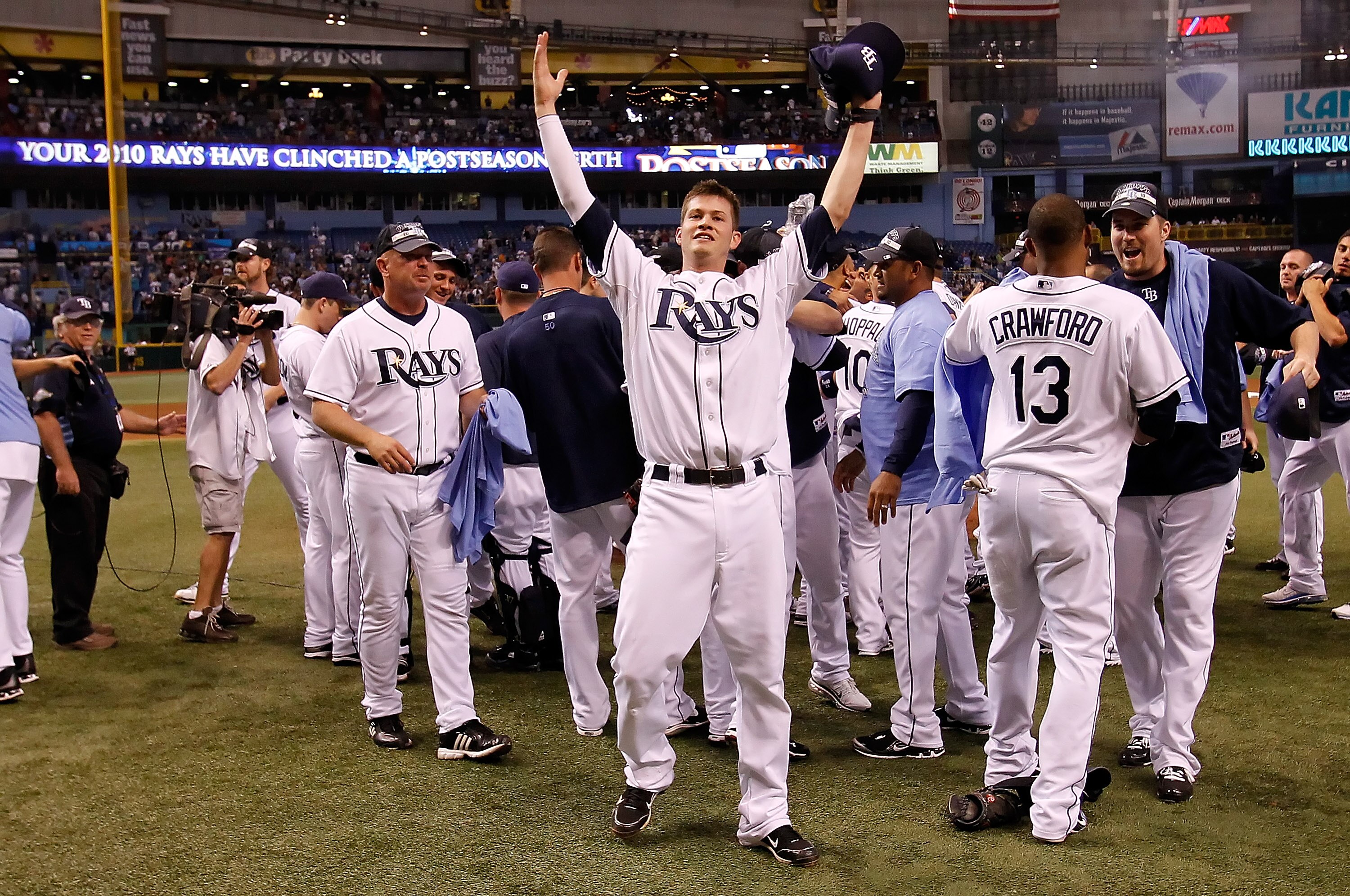 ST. PETERSBURG, FL - SEPTEMBER 28:  Infielder Reid Brignac #15 of the Tampa Bay Rays celebrates after the Rays clinched a playoff birth against the Baltimore Orioles at Tropicana Field on September 28, 2010 in St. Petersburg, Florida.  (Photo by J. Meric/