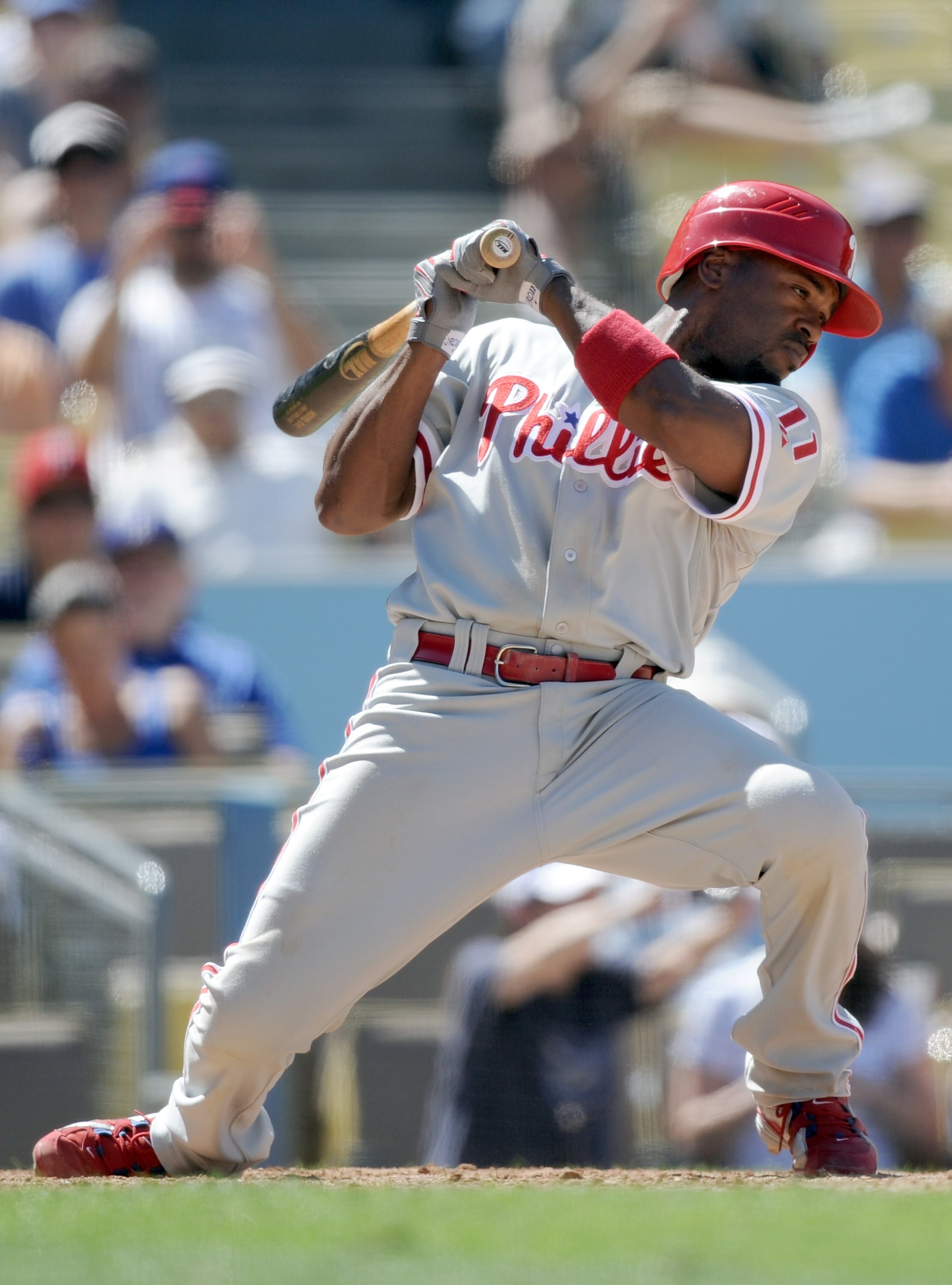 LOS ANGELES, CA - SEPTEMBER 01:  Jimmy Rollins #11 of the Philadelphia Phillies ducks a pitch against the Los Angeles Dodgers at Dodger Stadium on September 1, 2010 in Los Angeles, California.  (Photo by Harry How/Getty Images)