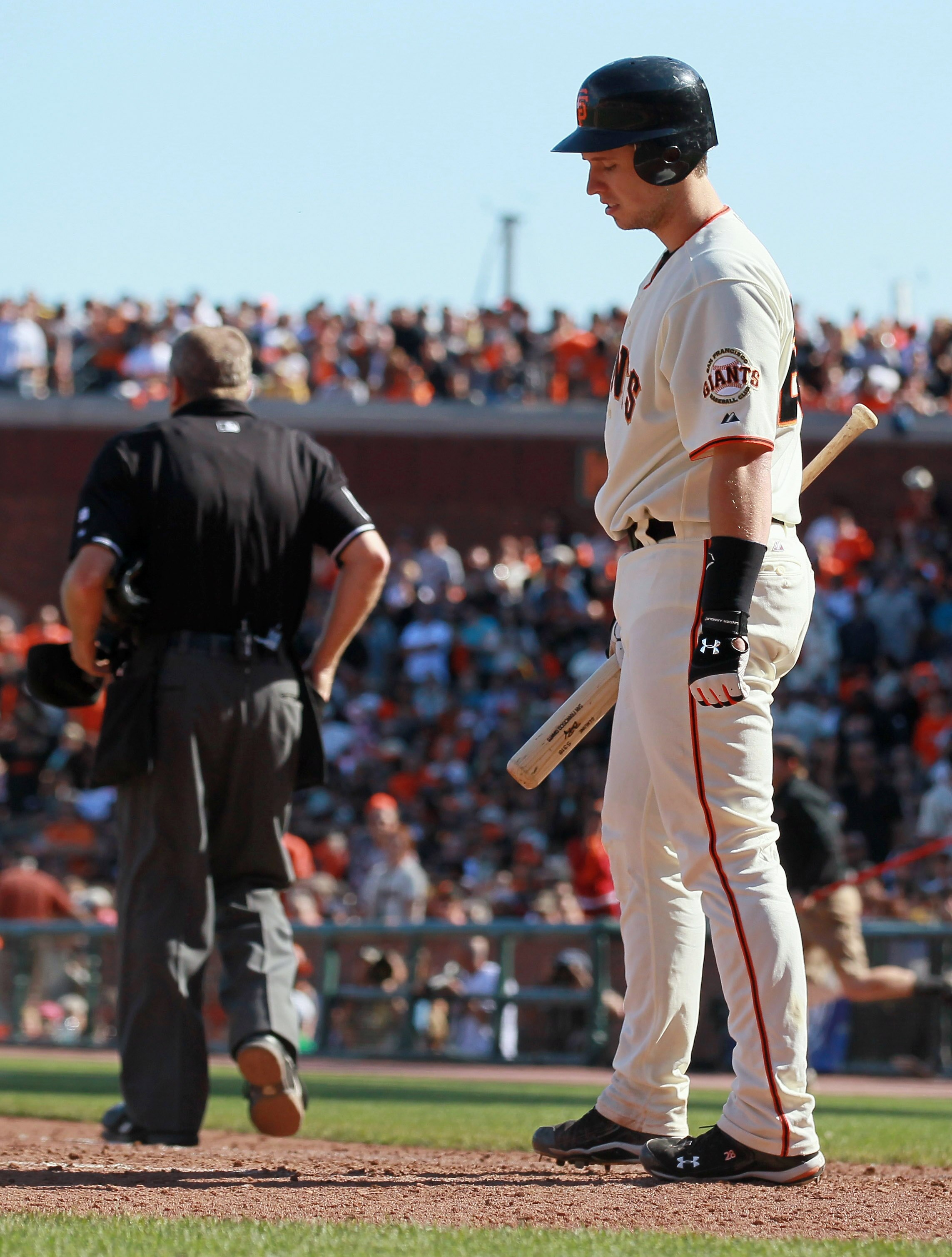 SAN FRANCISCO - OCTOBER 02:  Buster Posey #28 of the San Francisco Giants reacts after he was struck out during the sixth inning against the San Diego Padres at AT&T Park on October 2, 2010 in San Francisco, California.  (Photo by Justin Sullivan/Getty Im