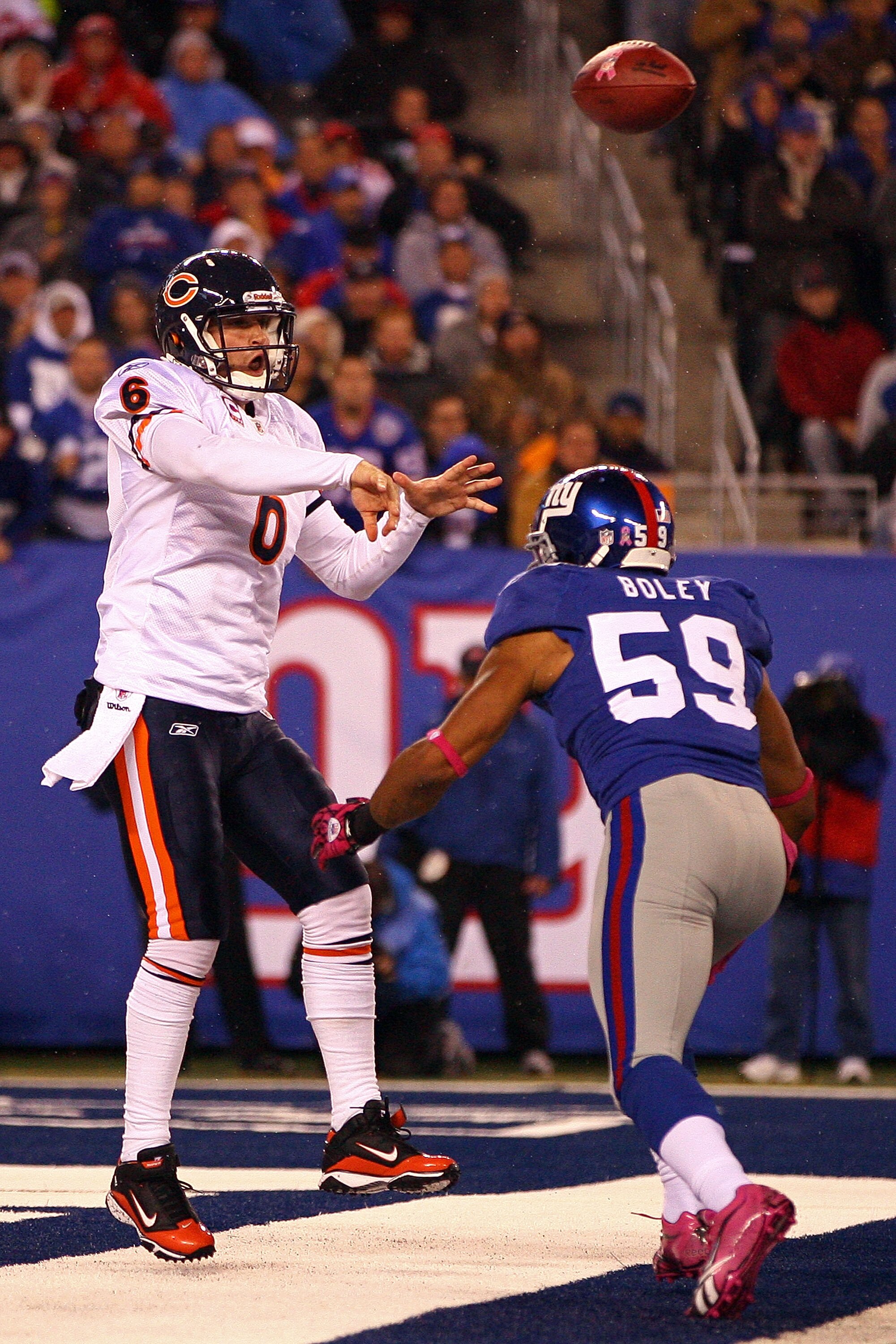 EAST RUTHERFORD, NJ - OCTOBER 03:  Jay Cutler #6 of the Chicago Bears passes against Michael Boley #59 of the New York Giants at New Meadowlands Stadium on October 3, 2010 in East Rutherford, New Jersey.  (Photo by Andrew Burton/Getty Images)