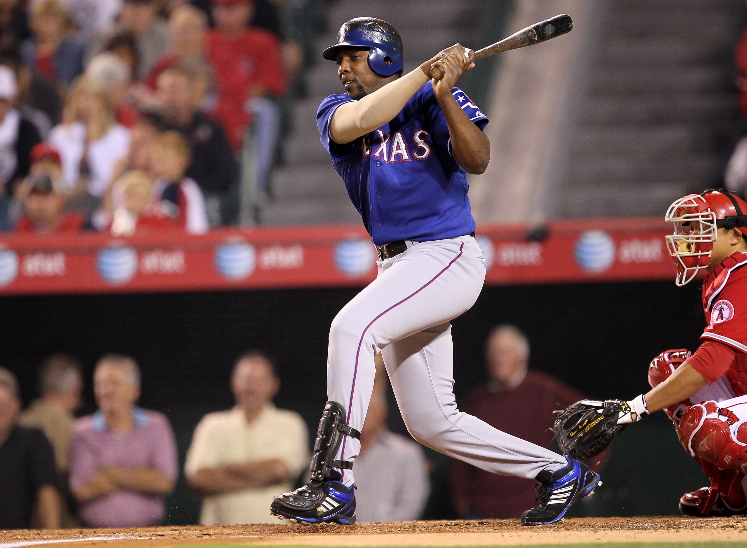 ANAHEIM, CA - SEPTEMBER 21:  Vladimir Guerrero #27 of the Texas Rangers hits a single in the second inning against the Los Angeles Angels of Anaheim on September 21, 2010 at Angel Stadium in Anaheim, California.  (Photo by Stephen Dunn/Getty Images)