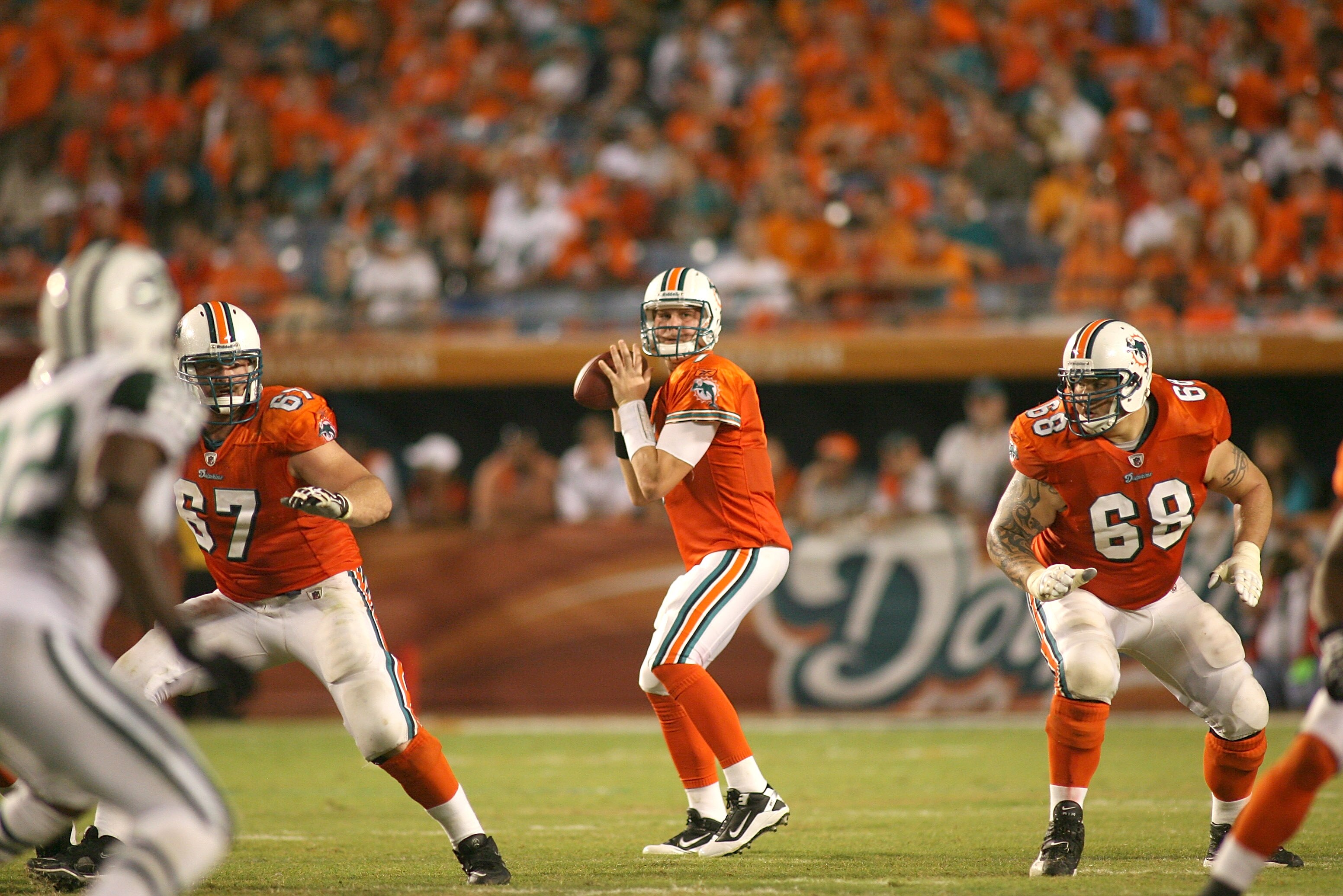 MIAMI - SEPTEMBER 26: Quarterback Chad Henne #7 of the Miami Dolphins throws against the New York Jets at Sun Life Stadium on September 26, 2010 in Miami, Florida. The Jets won 31-23. (Photo by Marc Serota/Getty Images)