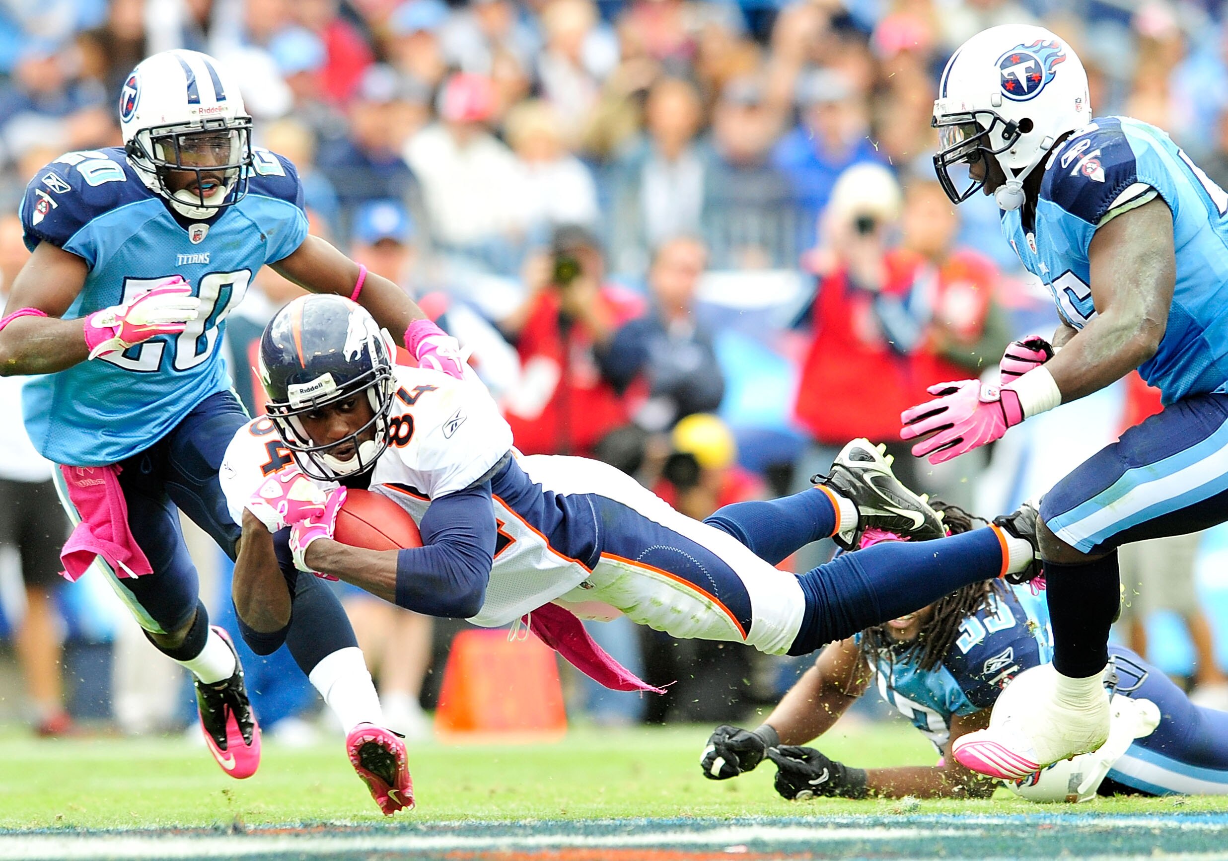 NASHVILLE, TN - OCTOBER 03:  Brandon Lloyd #84  of the Denver Broncos dives for extra yardage against the Tennessee Titans at LP Field on October 3, 2010 in Nashville, Tennessee. Denver won 26-20.  (Photo by Grant Halverson/Getty Images)