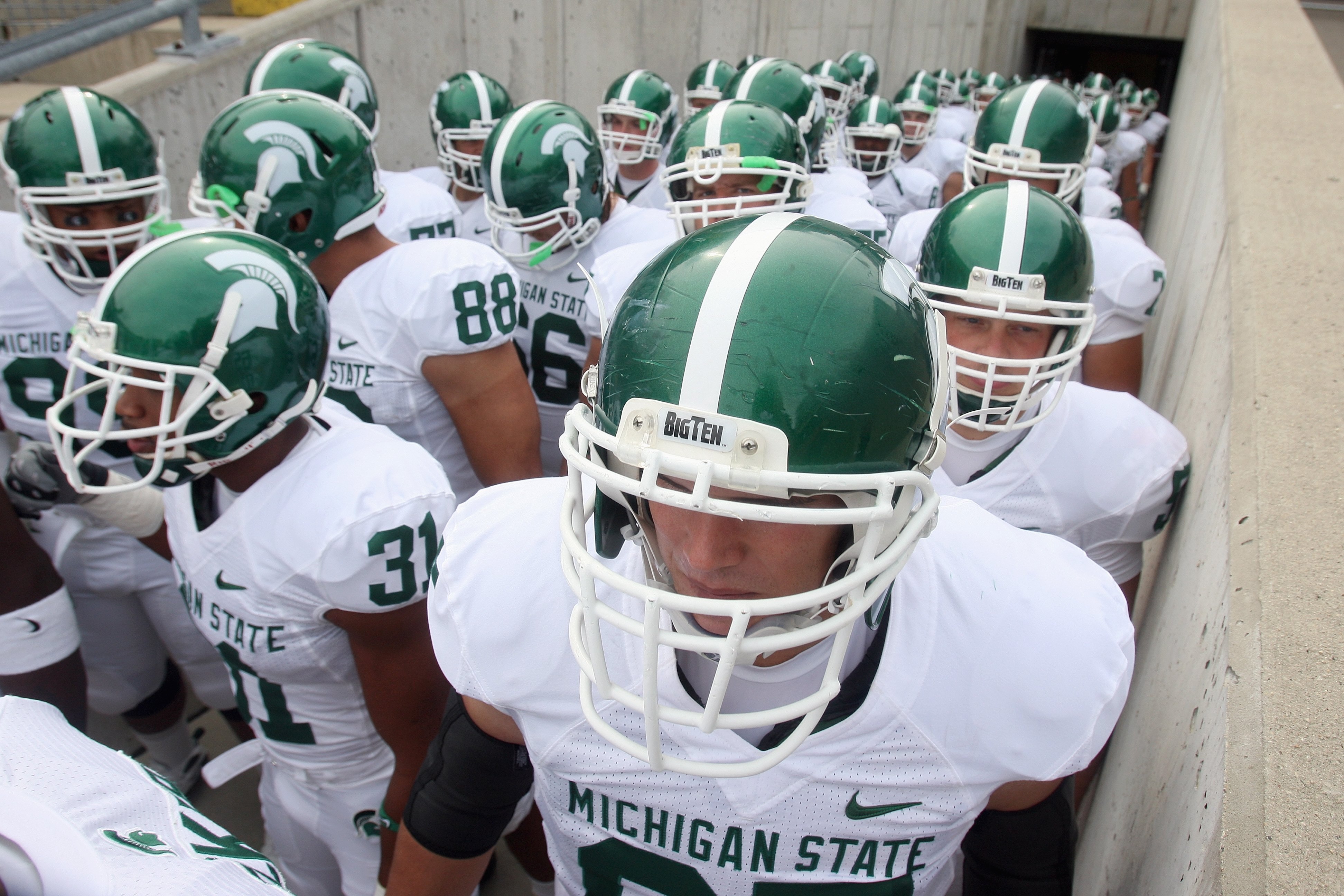MADISON, WI - SEPTEMBER 26: Members of the Michigan State Spartans wait to enter the field of play before a game against the Wisconsin Badgers on September 26, 2009 at Camp Randall Stadium in Madison, Wisconsin. (Photo by Jonathan Daniel/Getty Images)