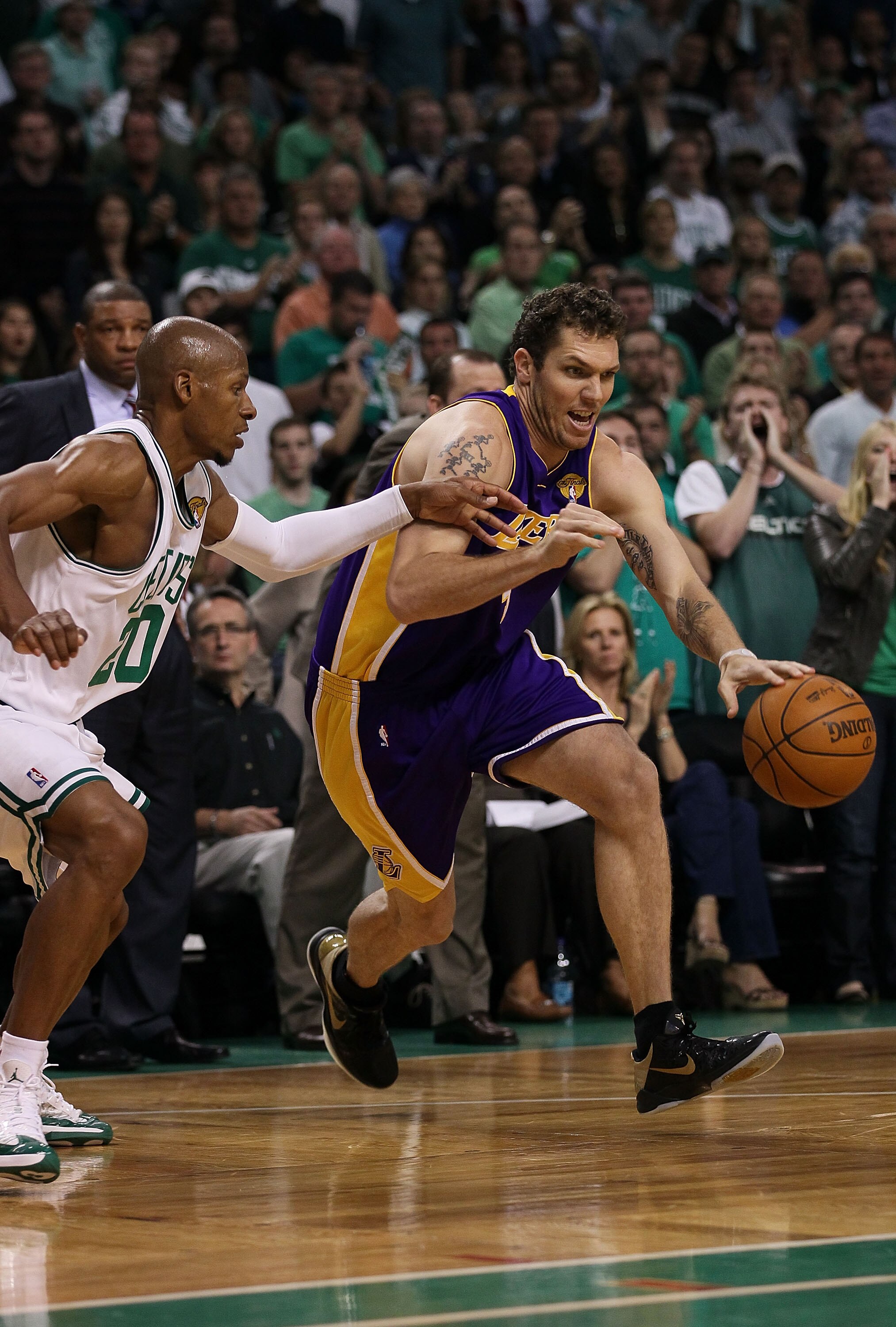 BOSTON - JUNE 13:  Luke Walton #4 of the Los Angeles Lakers drives against Ray Allen #20 of the Boston Celtics during Game Five of the 2010 NBA Finals on June 13, 2010 at TD Garden in Boston, Massachusetts. NOTE TO USER: User expressly acknowledges and ag