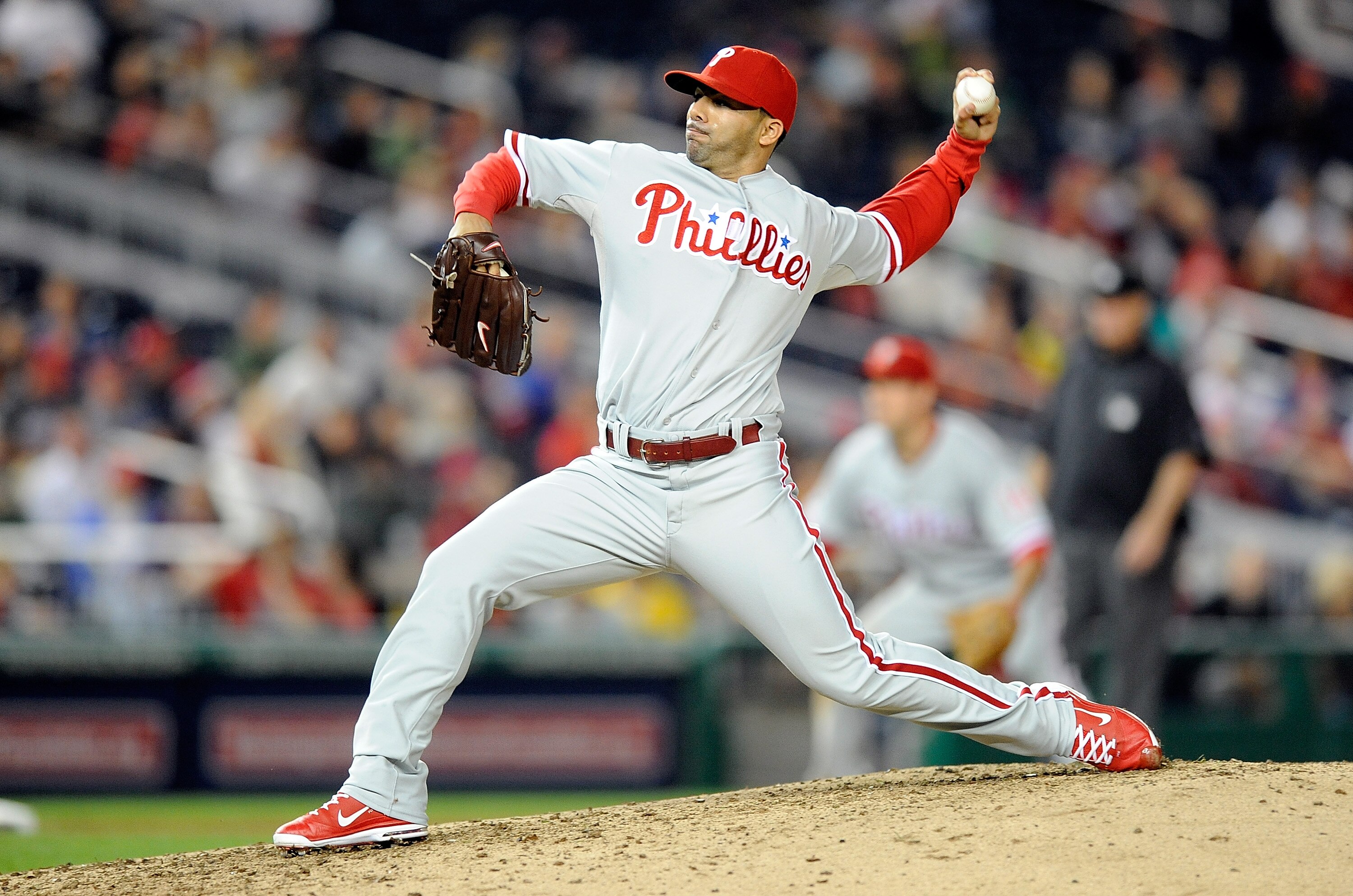 WASHINGTON - SEPTEMBER 29:  J.C. Romero #16 of the Philadelphia Phillies pitches against the Washington Nationals at Nationals Park on September 29, 2010 in Washington, DC.  (Photo by Greg Fiume/Getty Images)