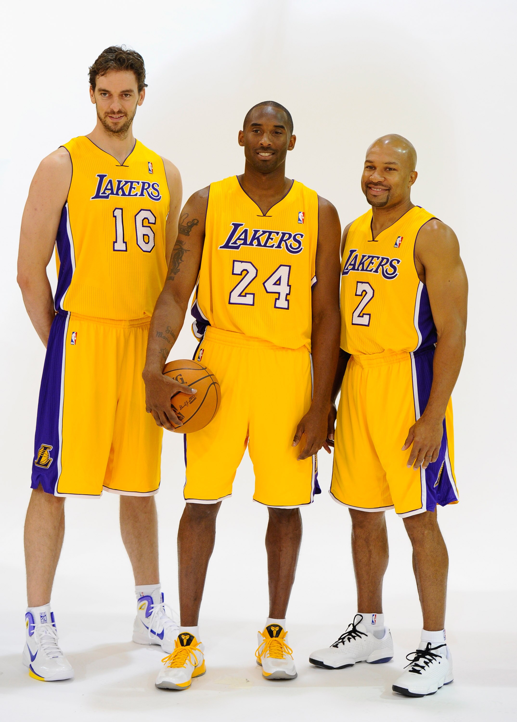 EL SEGUNDO, CA - SEPTEMBER 25:  Kobe Bryant #24,  Pau Gasol #16 and Derek Fisher #2 of the Los Angeles Lakers pose for a photograph during Media Day at the Toyota Center on September 25, 2010 in El Segundo, California. NOTE TO USER: User expressly acknowl