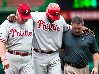 Ryan Howard limps off the field to join Utley and Victorino on the DL after an ankle injury in early August