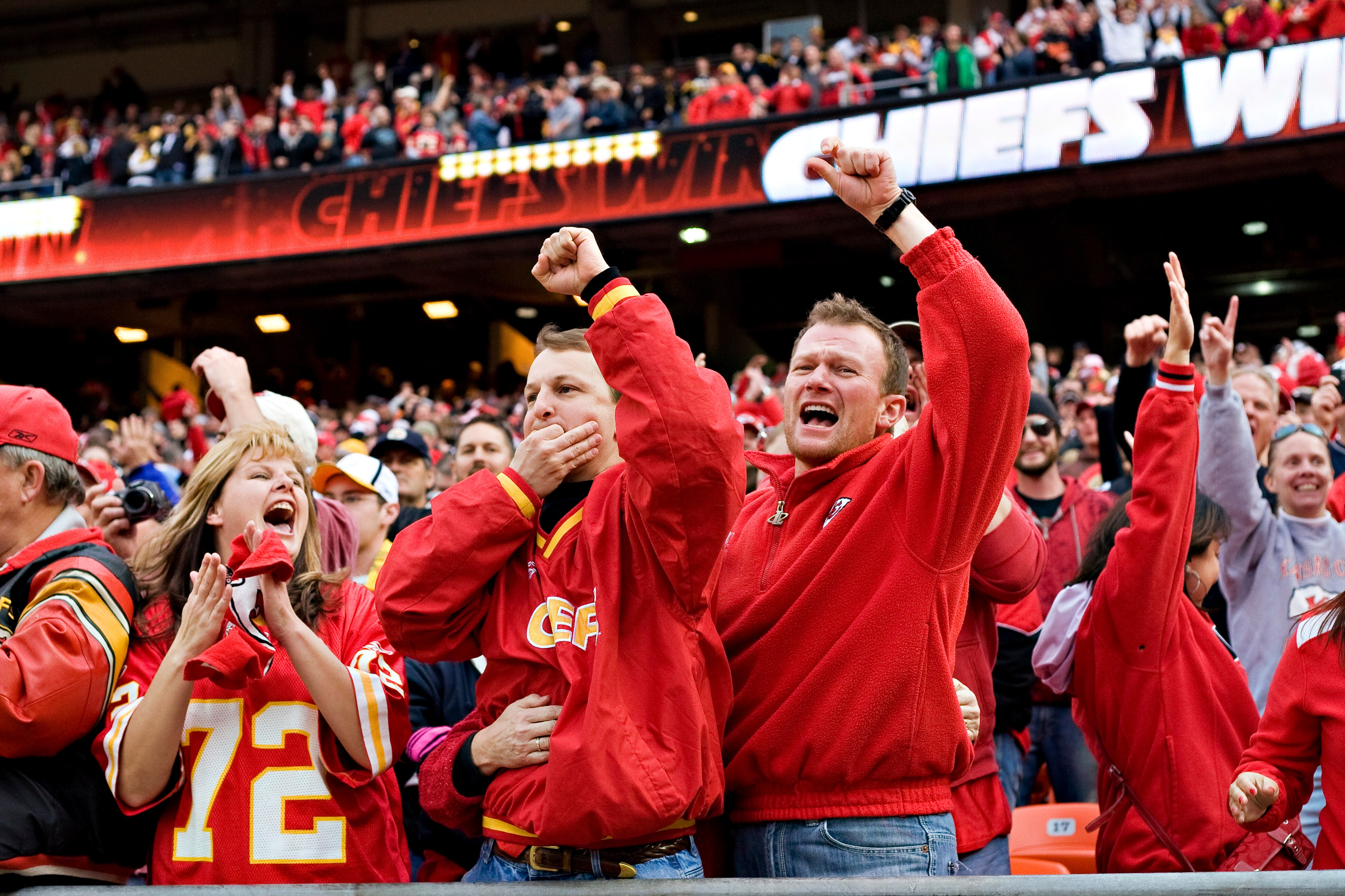 KANSAS CITY, MO - NOVEMBER 22: Fans of the Kansas City Chiefs celebrate after the game against the Pittsburgh Steelers at Arrowhead Stadium on November 22, 2009 in Kansas City, Missouri.  The Chiefs defeated the Steelers 27-24.  (Photo by Wesley Hitt/Gett