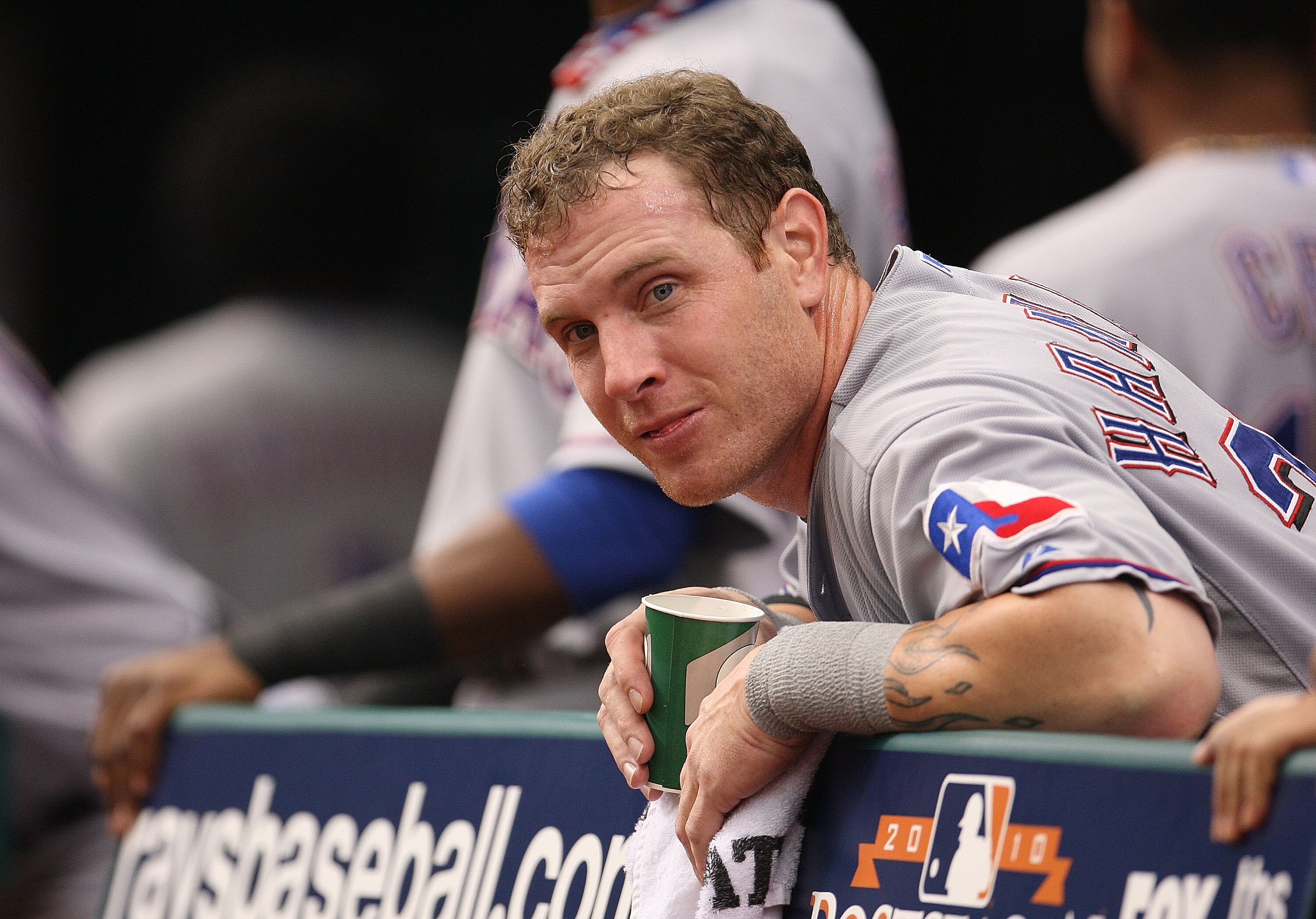 ST PETERSBURG, FL - OCTOBER 06:  6: Josh Hamilton (32) of the Texas Rangers waits in the dugout during Game 1 of the ALDS against the Tampa Bay Rays at Tropicana Field on October 6, 2010 in St. Petersburg, Florida.  (Photo by Mike Ehrmann/Getty Images)