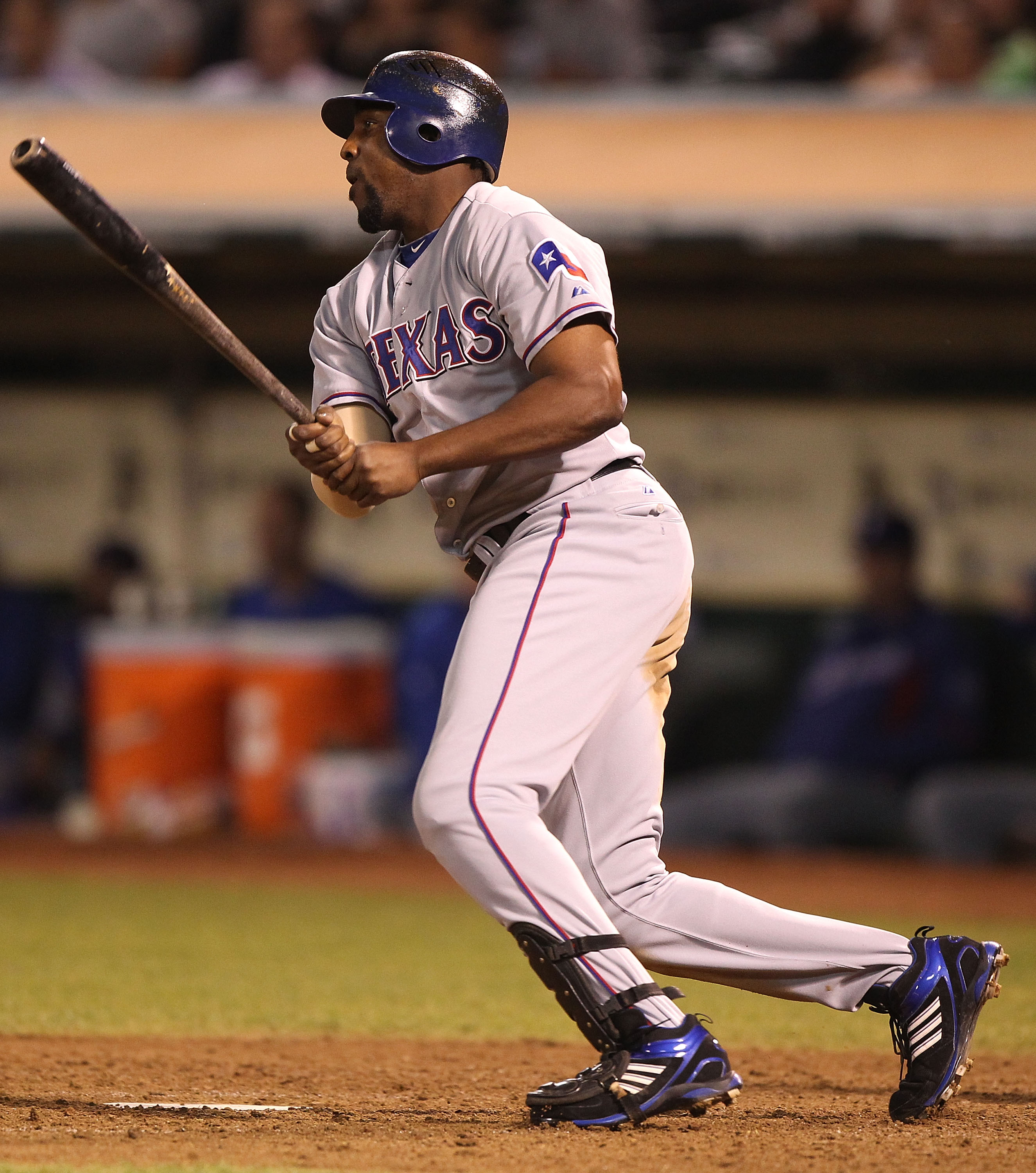 OAKLAND, CA - SEPTEMBER 24:  Vladimir Guerrero #27 of the Texas Rangers hits a three run double in the seventh inning against the Oakland Athletics during a Major League Baseball game at the Oakland-Alameda County Coliseum on September 24, 2010 in Oakland