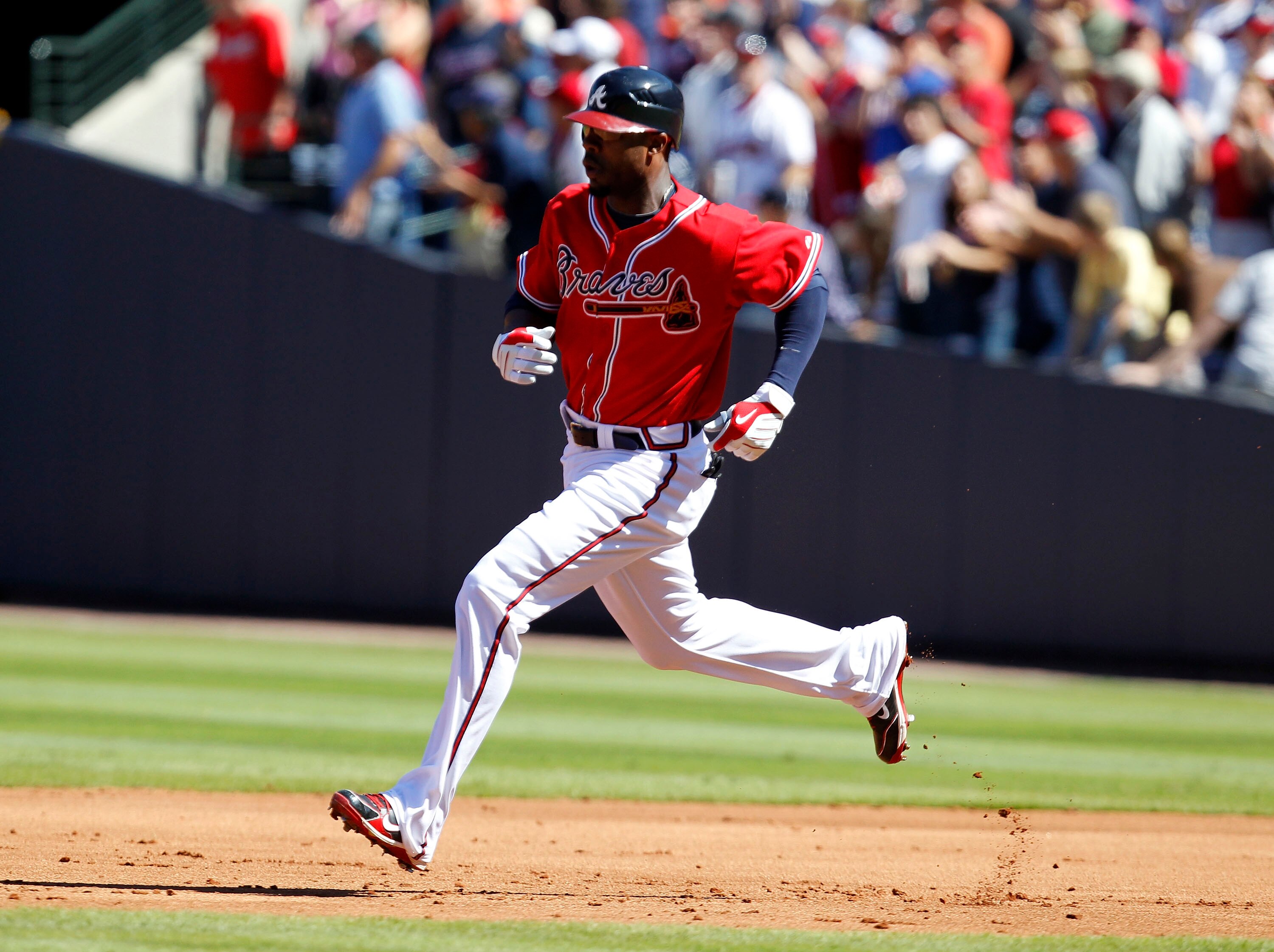 ATLANTA - OCTOBER 3:  RIght fielder Jason Heyward #22 of the Atlanta Braves runs for a triple during the game against the Philadelphia Phillies at Turner Field on October 3, 2010 in Atlanta, Georgia.  The Braves beat the Phillies 8-7.  (Photo by Mike Zarr