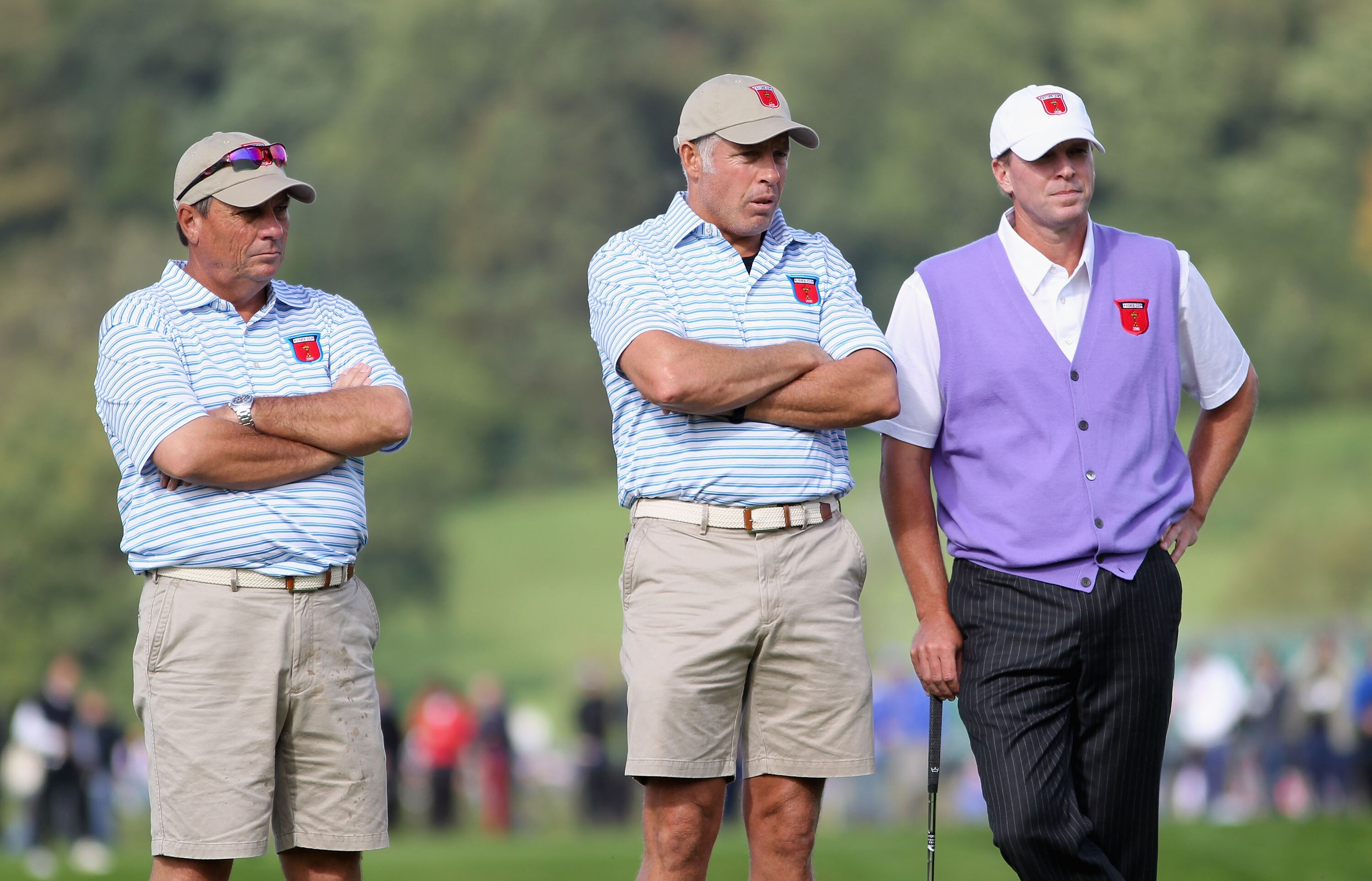 NEWPORT, WALES - OCTOBER 02:  USA Team caddies Jimmy Johnson (L) and Steve Williams (C) wait alongside Steve Stricker during the rescheduled Afternoon Foursome Matches during the 2010 Ryder Cup at the Celtic Manor Resort on October 2, 2010 in Newport, Wal