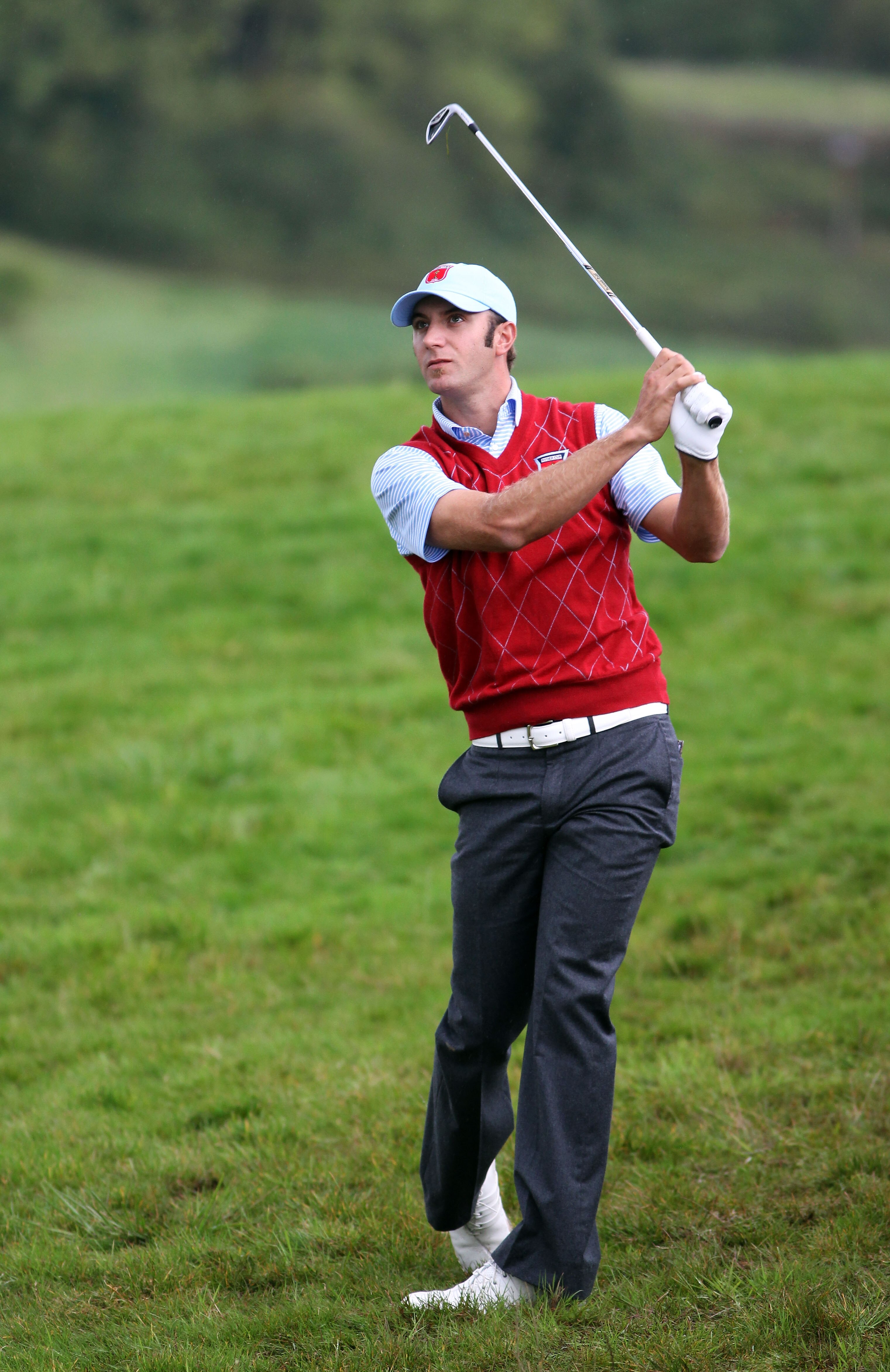 NEWPORT, WALES - OCTOBER 03:  Dustin Johnson of the USA hits a shot during the Fourball & Foursome Matches during the 2010 Ryder Cup at the Celtic Manor Resort on October 3, 2010 in Newport, Wales.  (Photo by Jamie Squire/Getty Images)