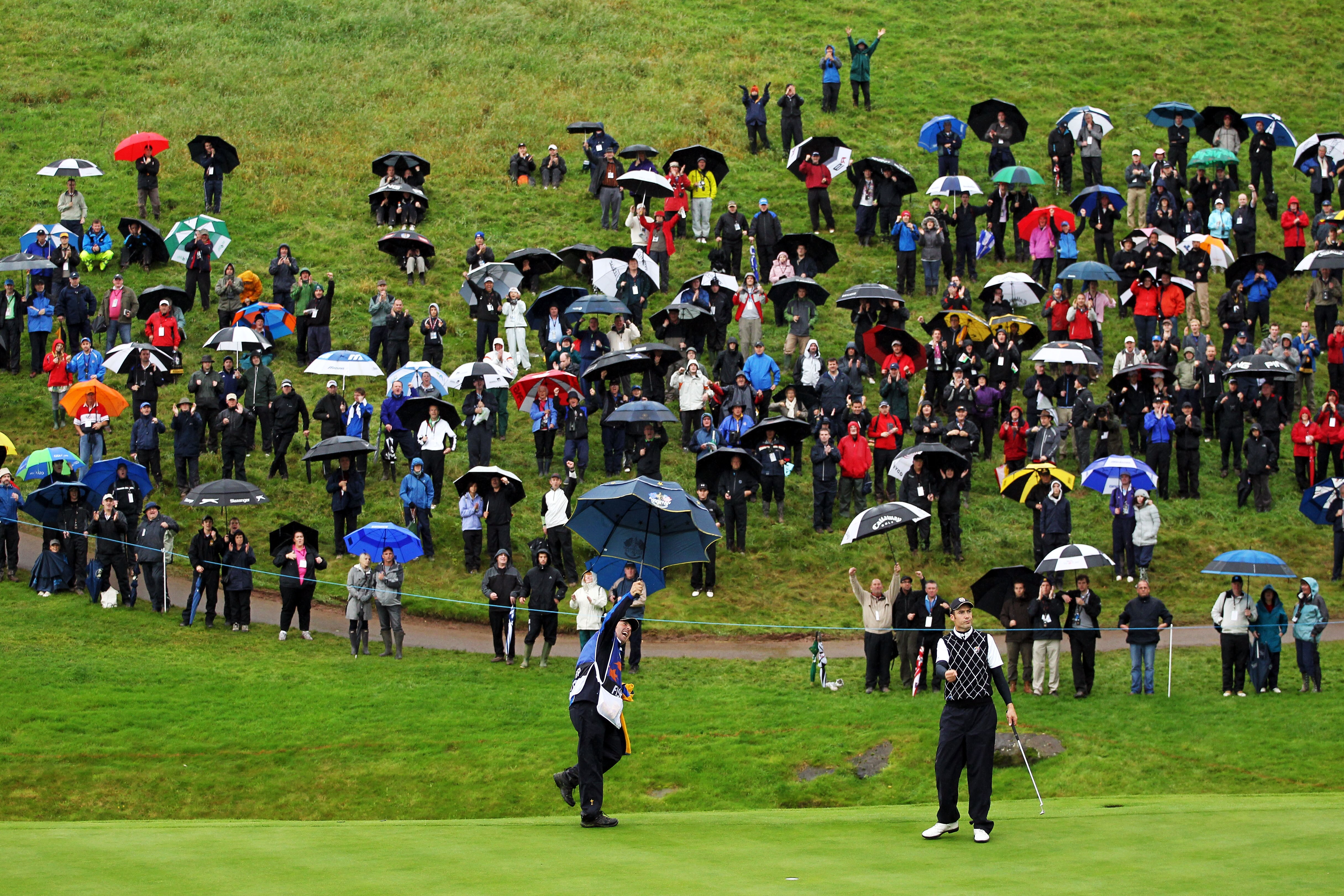 NEWPORT, WALES - OCTOBER 03:   Ross Fisher of Europe celebrates holing a putt on the 15th green during the  Fourball & Foursome Matches during the 2010 Ryder Cup at the Celtic Manor Resort on October 3, 2010 in Newport, Wales. (Photo by Jamie Squire/Getty