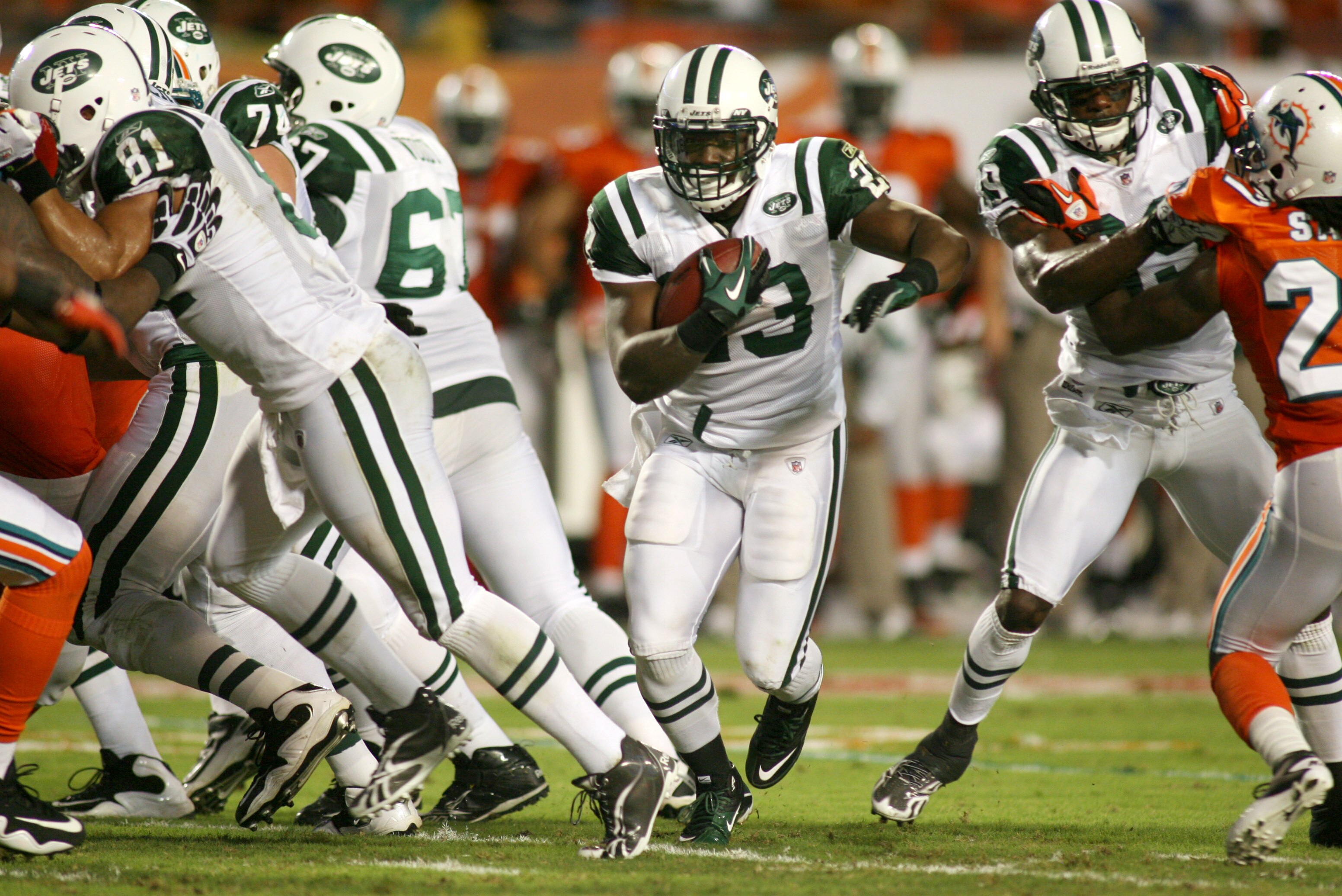 MIAMI - SEPTEMBER 26: Running back Shonn Greene #23 of the New York Jets runs against the Miami Dolphins at Sun Life Stadium on September 26, 2010 in Miami, Florida. The Jets won 31-23. (Photo by Marc Serota/Getty Images)