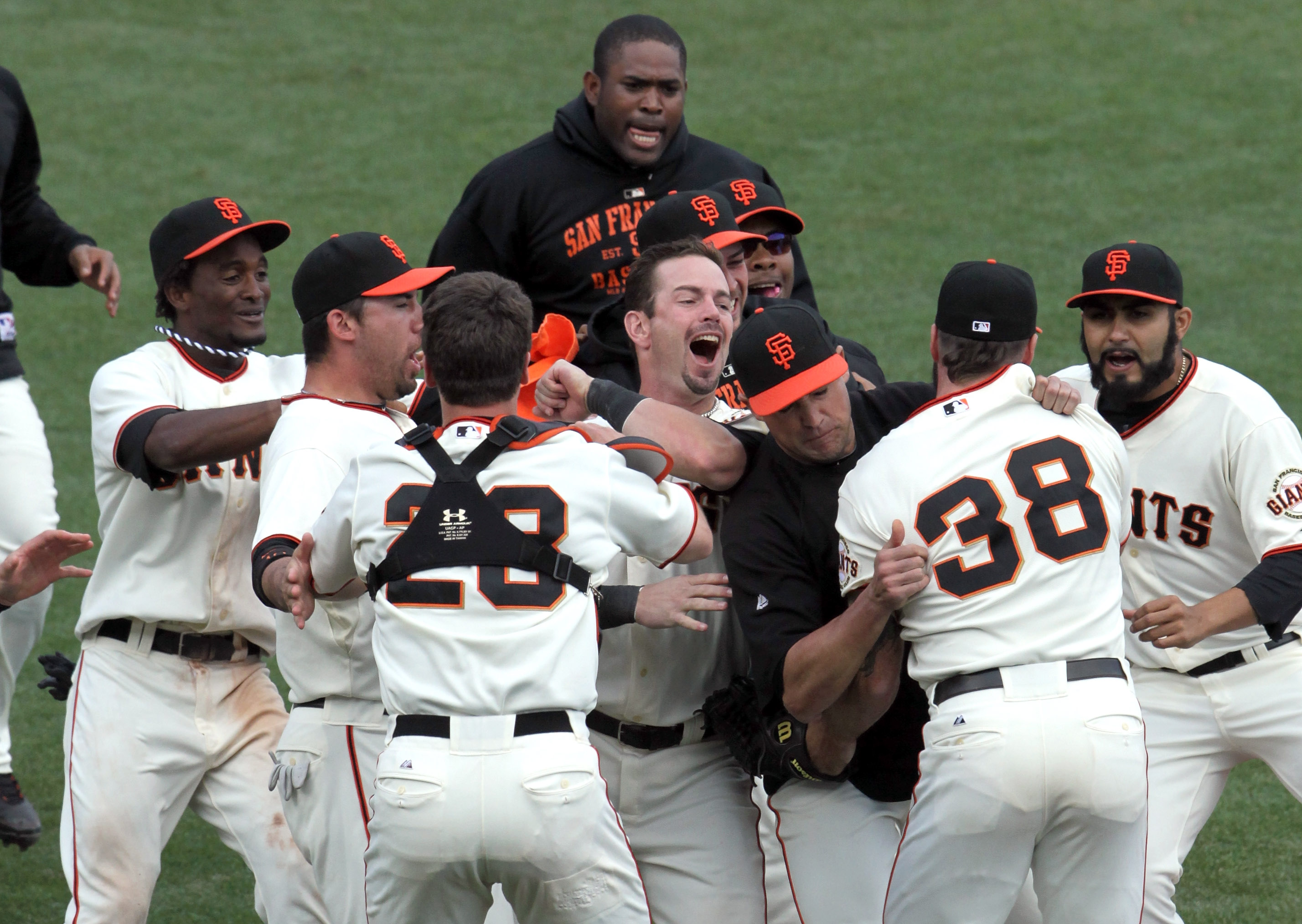 SAN FRANCISCO - OCTOBER 03:  San Francisco Giants players celebrate after clinching the National League West divsion against the San Diego Padres at AT&T Park on October 3, 2010 in San Francisco, California.  The Giants beat the Padres 3-0.  (Photo by Jus
