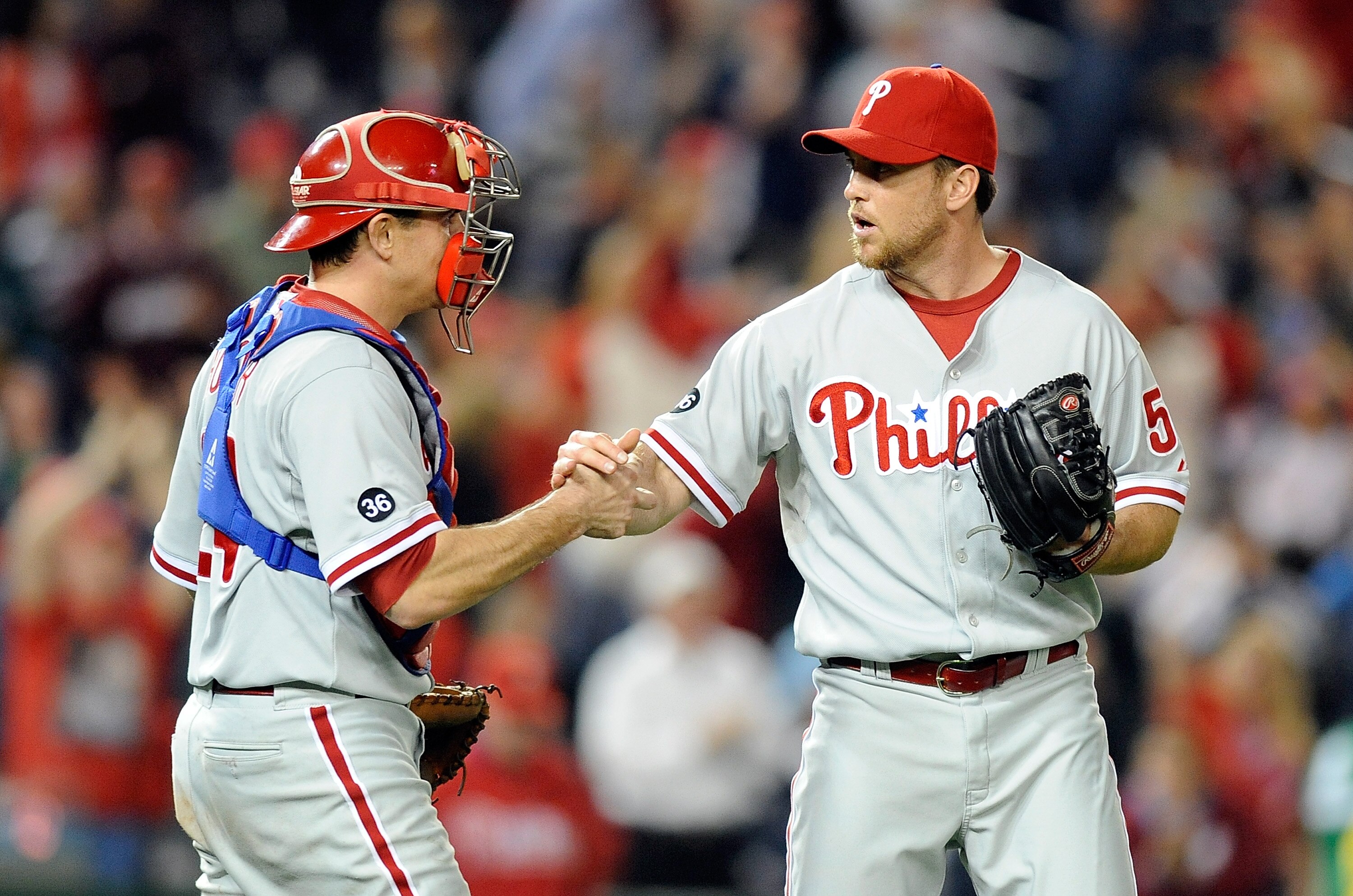 WASHINGTON - SEPTEMBER 29:  Brad Lidge #54 of the Philadelphia Phillies celebrates with Paul Hoover #24 after a 7-1 victory against the Washington Nationals at Nationals Park on September 29, 2010 in Washington, DC.  (Photo by Greg Fiume/Getty Images)