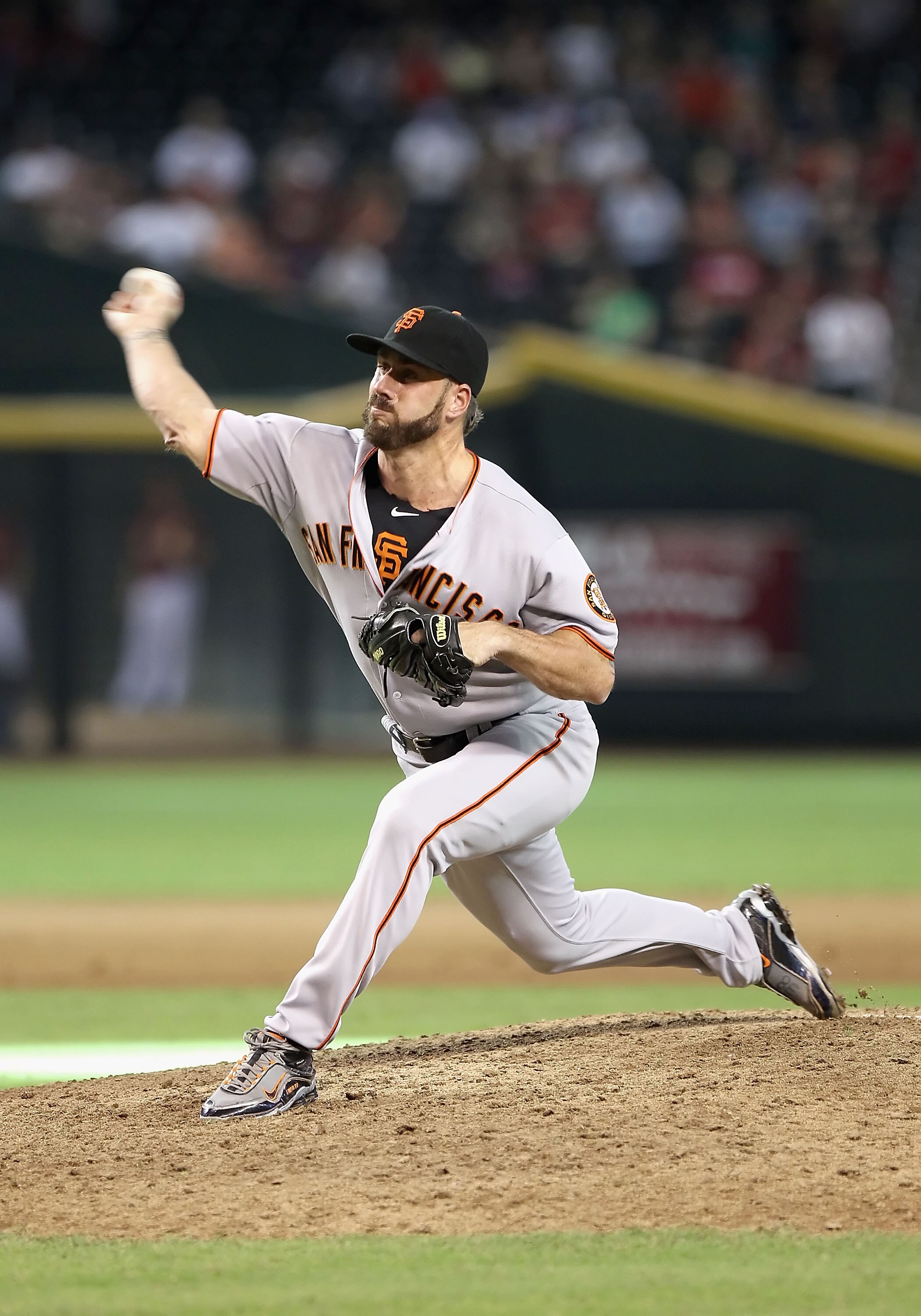 PHOENIX - SEPTEMBER 06:  Relief pitcher Brian Wilson #38 of the San Francisco Giants pitches against the Arizona Diamondbacks during the Major League Baseball game at Chase Field on September 6, 2010 in Phoenix, Arizona.  The Giants defeated the Diamondba