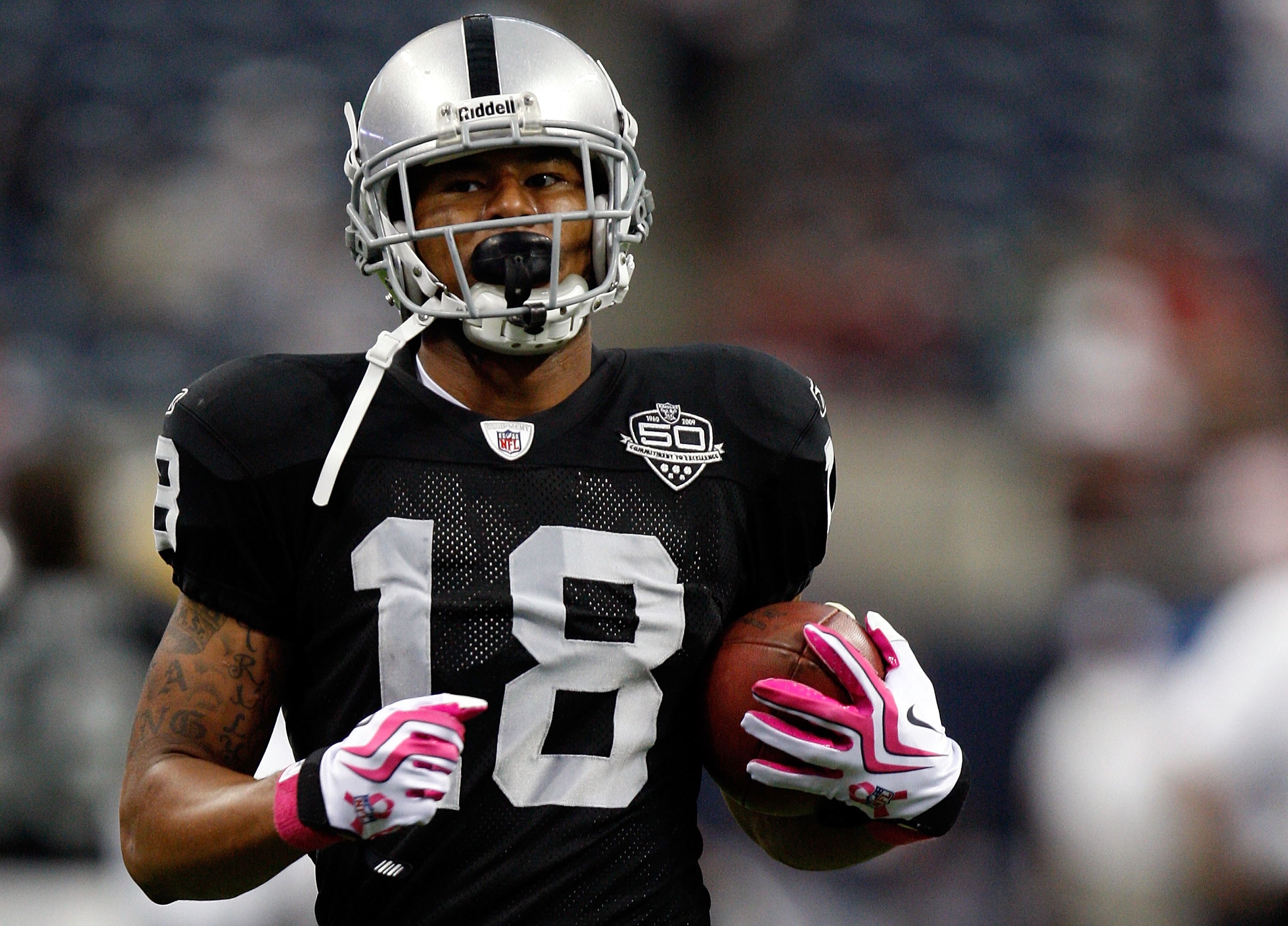 HOUSTON - OCTOBER 04:  Wide receiver Louis Murphy #18 of the Oakland Raiders at Reliant Stadium on October 4, 2009 in Houston, Texas.  (Photo by Ronald Martinez/Getty Images)