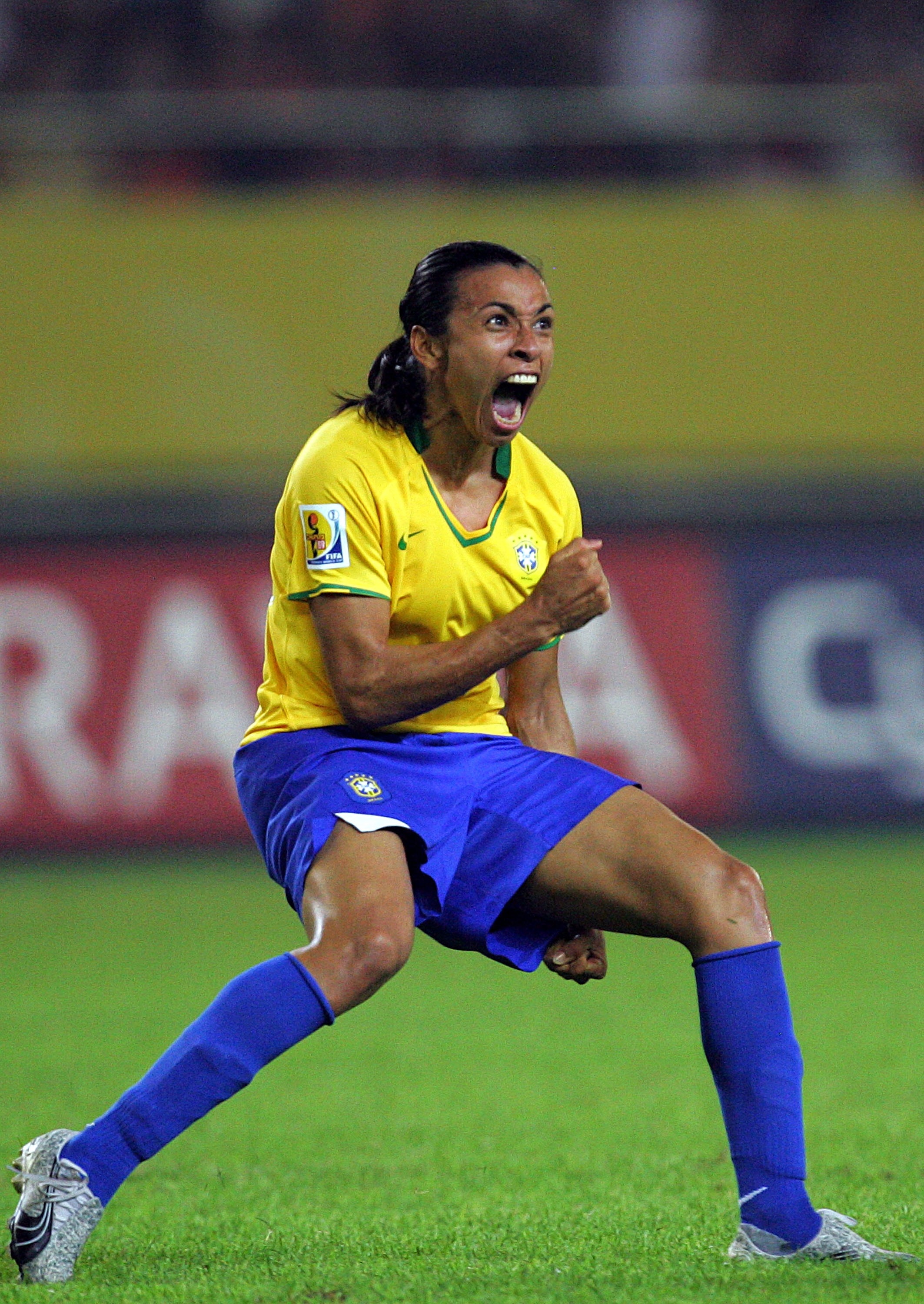 HANGZHOU, CHINA - SEPTEMBER 27: Marta Vieira Da Silva #10 of Brazil reacts after scoring a goal against USA during the semifinal of the Women's World Cup 2007 at Hangzhou Dragon Stadium on September 27, 2007 in Hangzhou, China.  (Photo by Ronald Martinez/