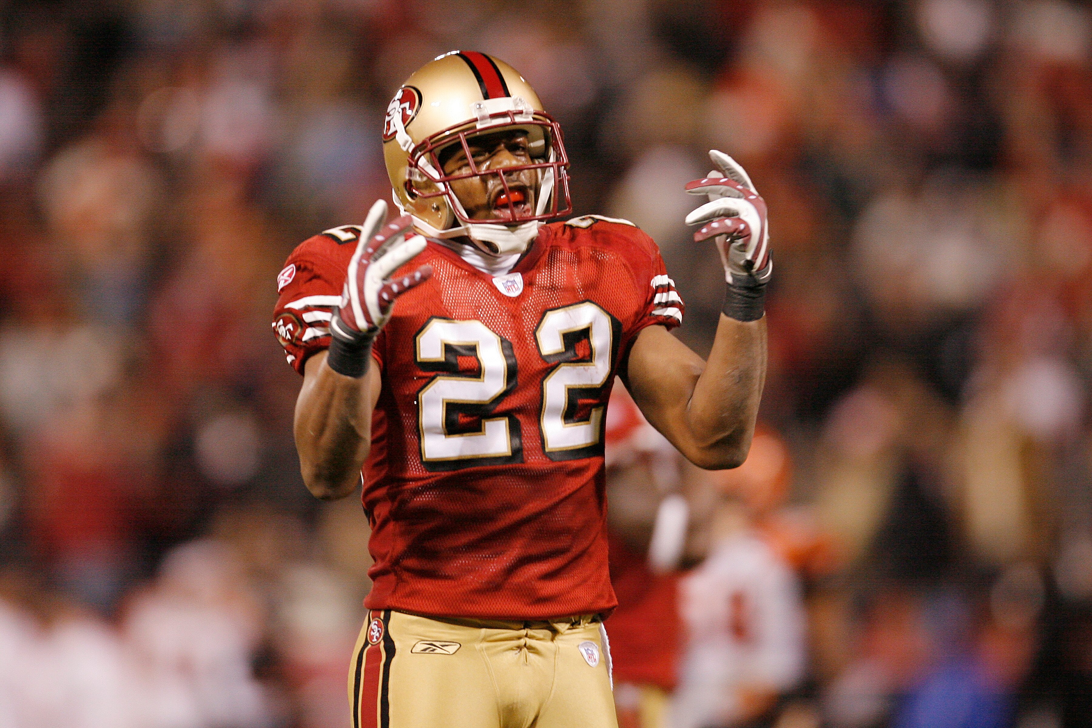 SAN FRANCISCO - DECEMBER 15:  Defensive back Nate Clements #22 of the San Francisco 49ers celebrates a final defensive stand during a game against the Cincinnati Bengals at Monster Park December 15, 2007 in San Francisco, California. San Francisco won 20-