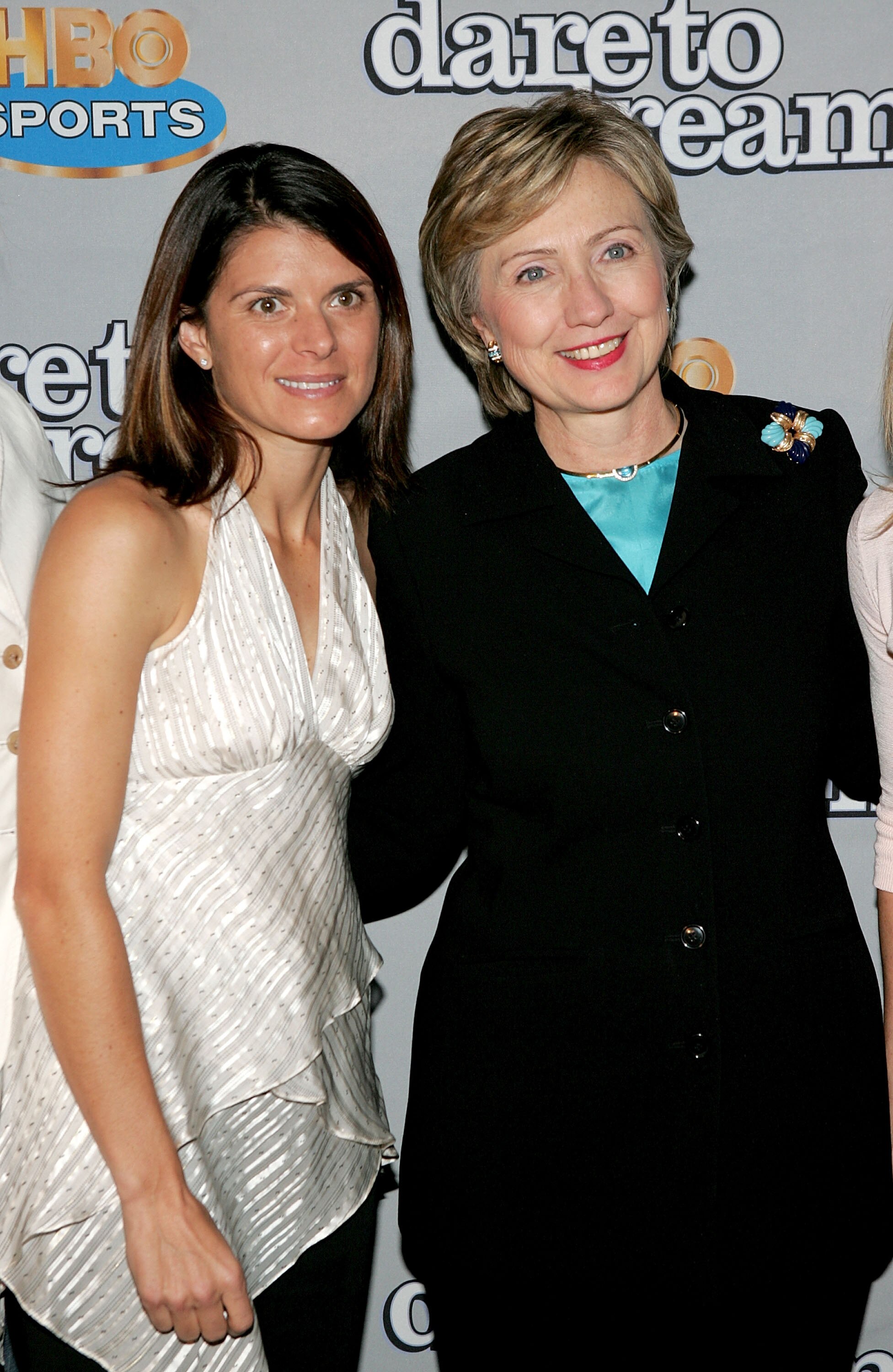 NEW YORK - NOVEMBER 29:  Member of the gold medal winning U.S. Women's National Team at the 1996 Olympic Games, Mia Hamm (L), poses for a photo with Senator Hillary Rodham Clinton as they attend the HBO Sports Premiere of 'Dare to Dream' at Loews Cineplex