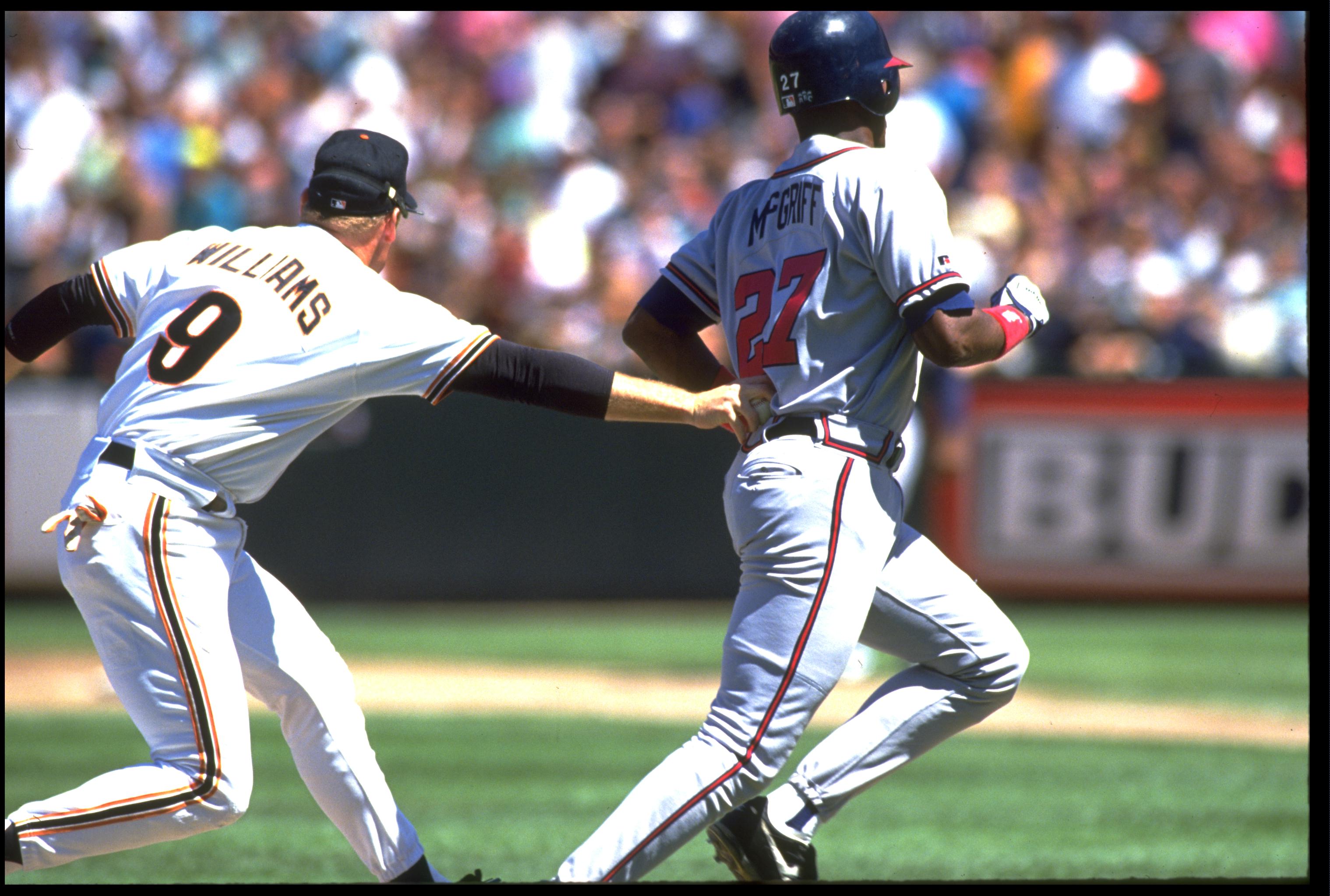 24 AUG 1993:  SAN FRANCISCO GIANTS THIRD BASEMAN MATT WILLIAMS (LEFT) TAGS OUT ATLANTA BRAVES FIRST BASEMAN FRED MCGRIFF DURING THE GIANTS GAME AT CANDLESTICK PARK IN SAN FRANCISCO, CALIFORNIA.  MANDATORY CREDIT:  OTTO GREULE/ALLSPORT